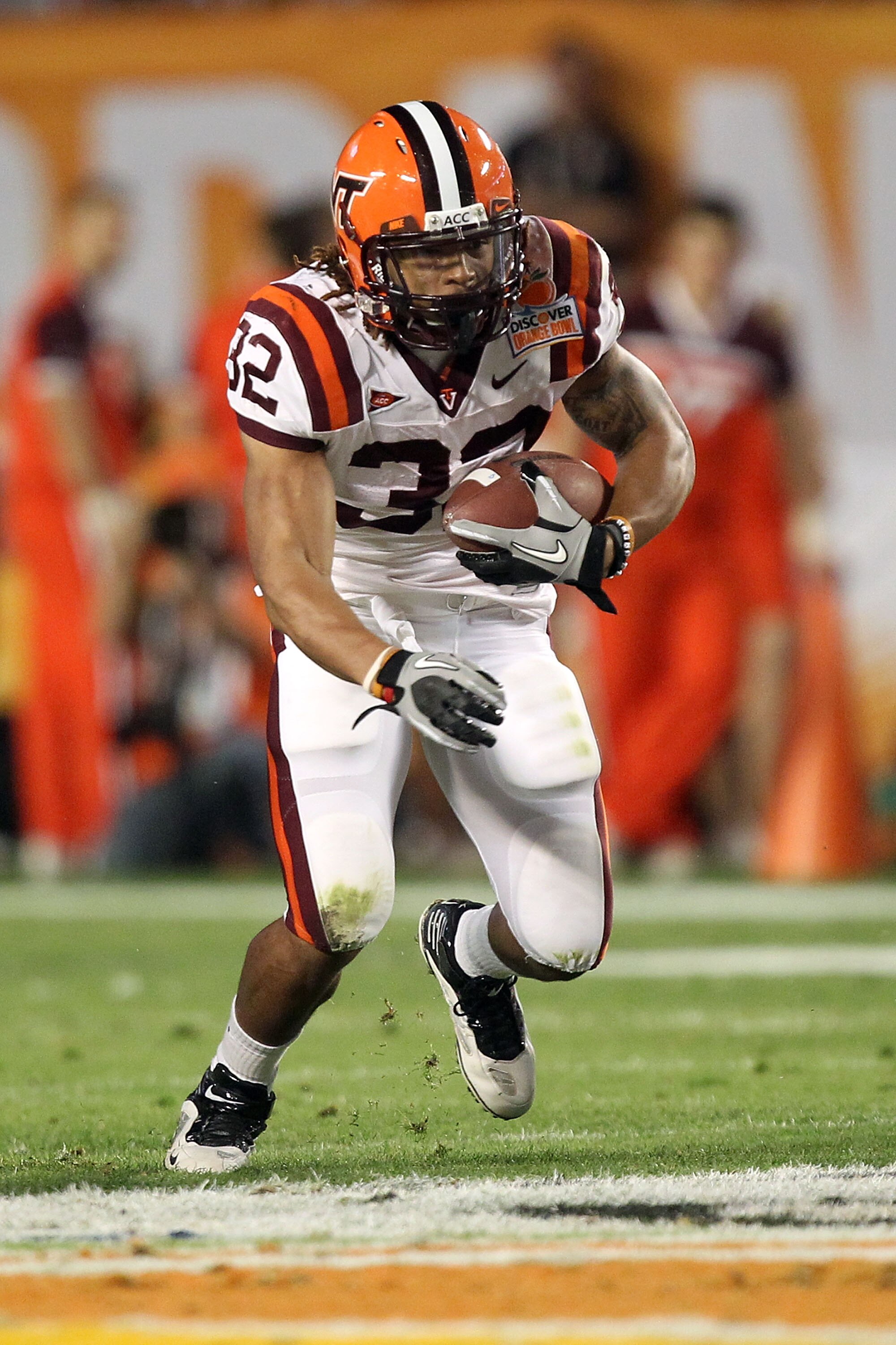 MIAMI, FL - JANUARY 03: Darren Evans #32 of the Virginia Tech Hokies runs the ball against the Stanford Cardinal during the 2011 Discover Orange Bowl at Sun Life Stadium on January 3, 2011 in Miami, Florida. Stanford won 40-12. (Photo by Streeter Lecka/ MIAMI, FL - JANUARY 03: Darren Evans #32 of the Virginia Tech Hokies runs the ball against the Stanford Cardinal during the 2011 Discover Orange Bowl at Sun Life Stadium on January 3, 2011 in Miami, Florida. Stanford won 40-12. (Photo by Streeter Lecka/