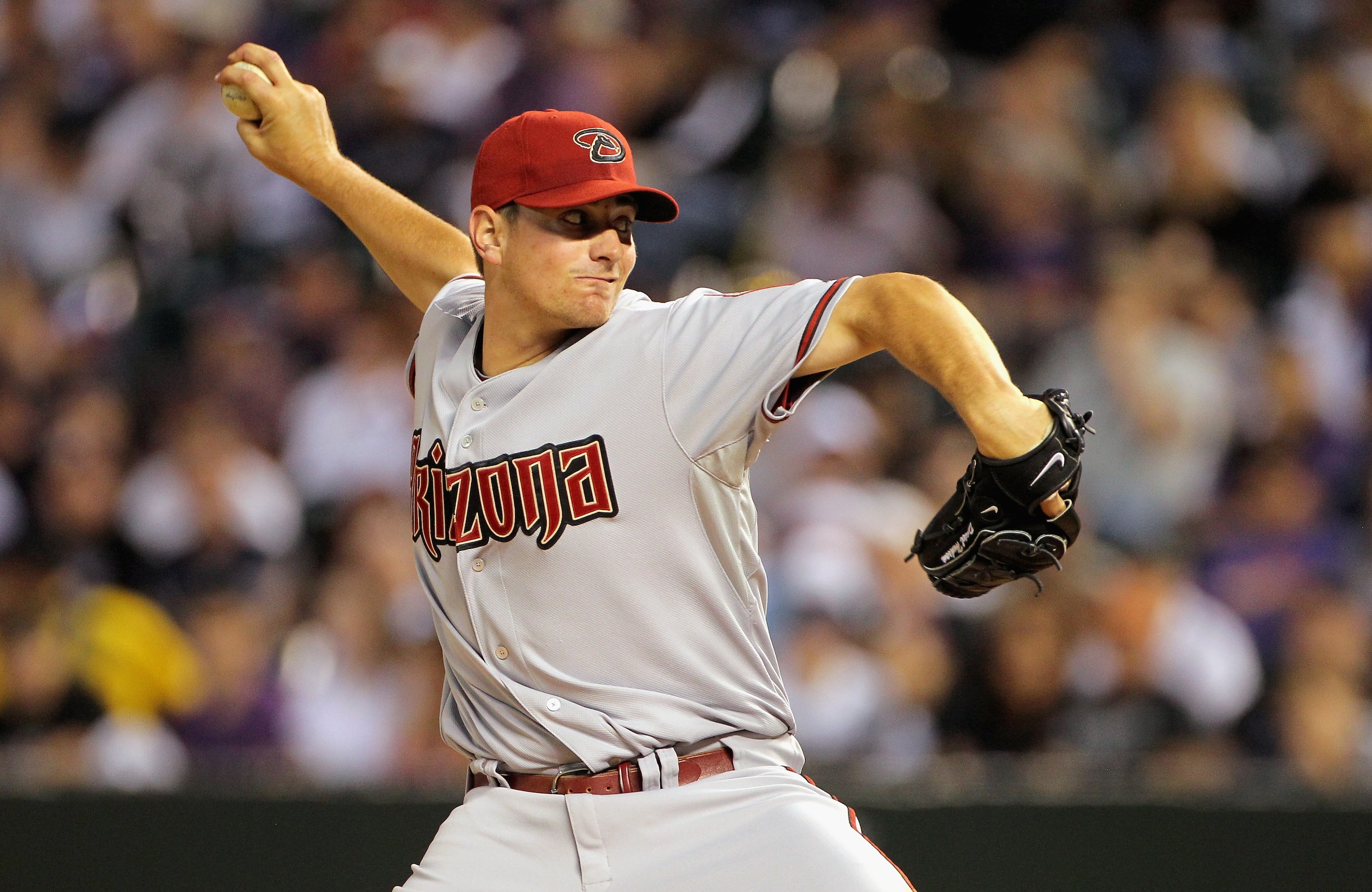 DENVER, CO - APRIL 02: Starting pitcher Daniel Hudson #41 of the Arizona Diamondbacks delivers against the Colorado Rockies at Coors Field on April 2, 2011 in Denver, Colorado. (Photo by Doug Pensinger/Getty Images) DENVER, CO - APRIL 02: Starting pitcher Daniel Hudson #41 of the Arizona Diamondbacks delivers against the Colorado Rockies at Coors Field on April 2, 2011 in Denver, Colorado. (Photo by Doug Pensinger/Getty Images)