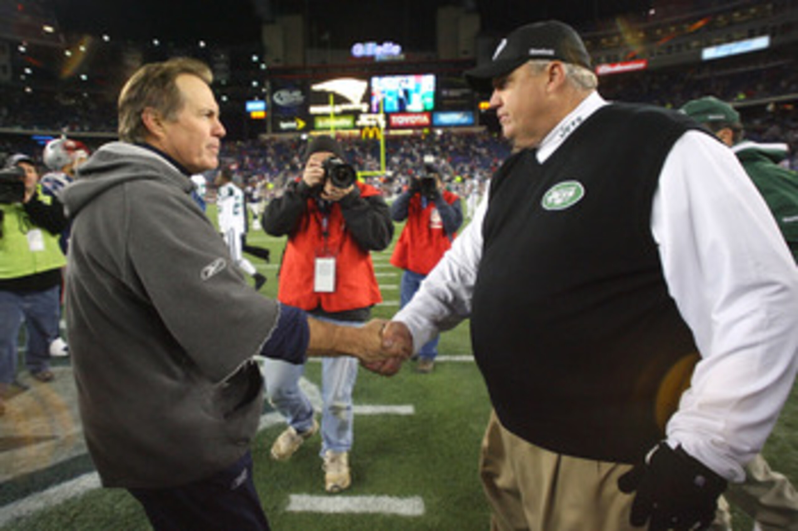 FOXBORO, MA - NOVEMBER 22: Bill Belichick of the New England Patriots shakes hands with Rex Ryan of the New York on November 22, 2009 in Foxboro, Massachusetts. The Patriots won 31-14. (Photo by Jim Rogash/Getty Images) FOXBORO, MA - NOVEMBER 22: Bill Belichick of the New England Patriots shakes hands with Rex Ryan of the New York on November 22, 2009 in Foxboro, Massachusetts. The Patriots won 31-14. (Photo by Jim Rogash/Getty Images)
