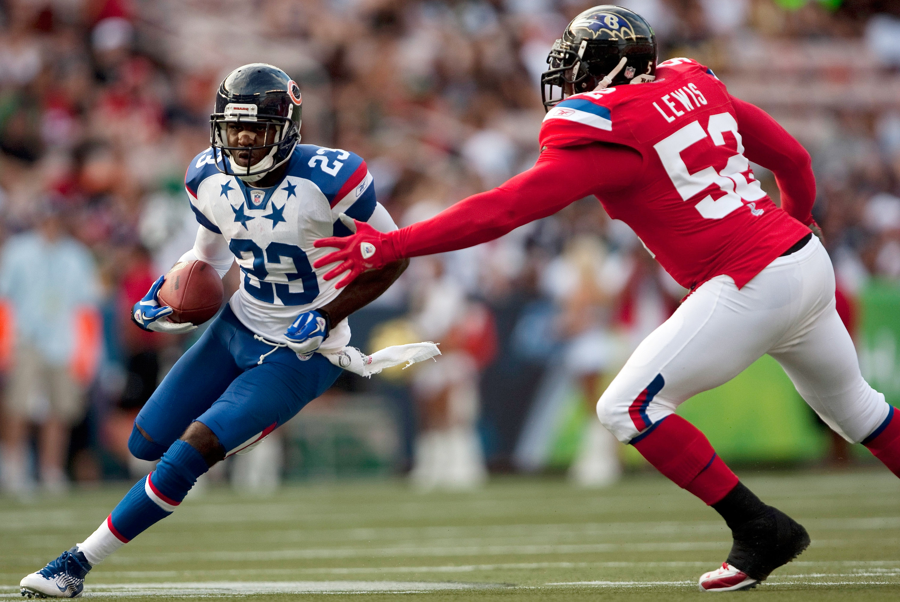 HONOLULU - JANUARY 30:  Devin Hester #23 of the Chicago Bears carries the ball against the American Football Conference (AFC) during the 2011 NFL Pro Bowl at Aloha Stadium on January 30, 2011 in Honolulu, Hawaii.  (Photo by Kent Nishimura/Getty Images)