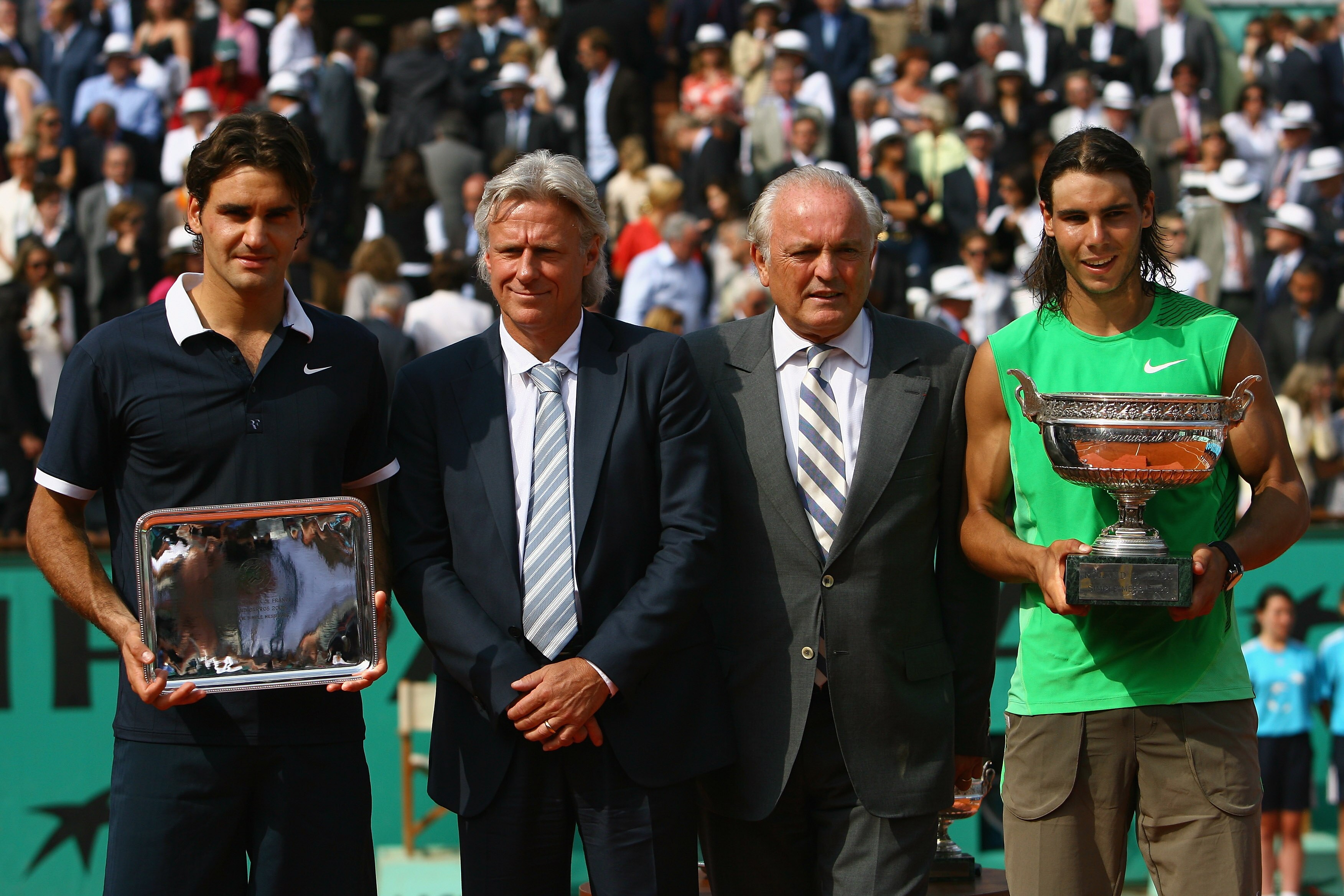 PARIS - JUNE 08:  Roger Federer of Switzerland, Bjorn Borg of Sweden, Christian Bimes of the FFT and Rafael Nadal of Spain pose for photos after the final match between  during the Men's Singles Final match on day fifteen of the French Open at Roland Garr