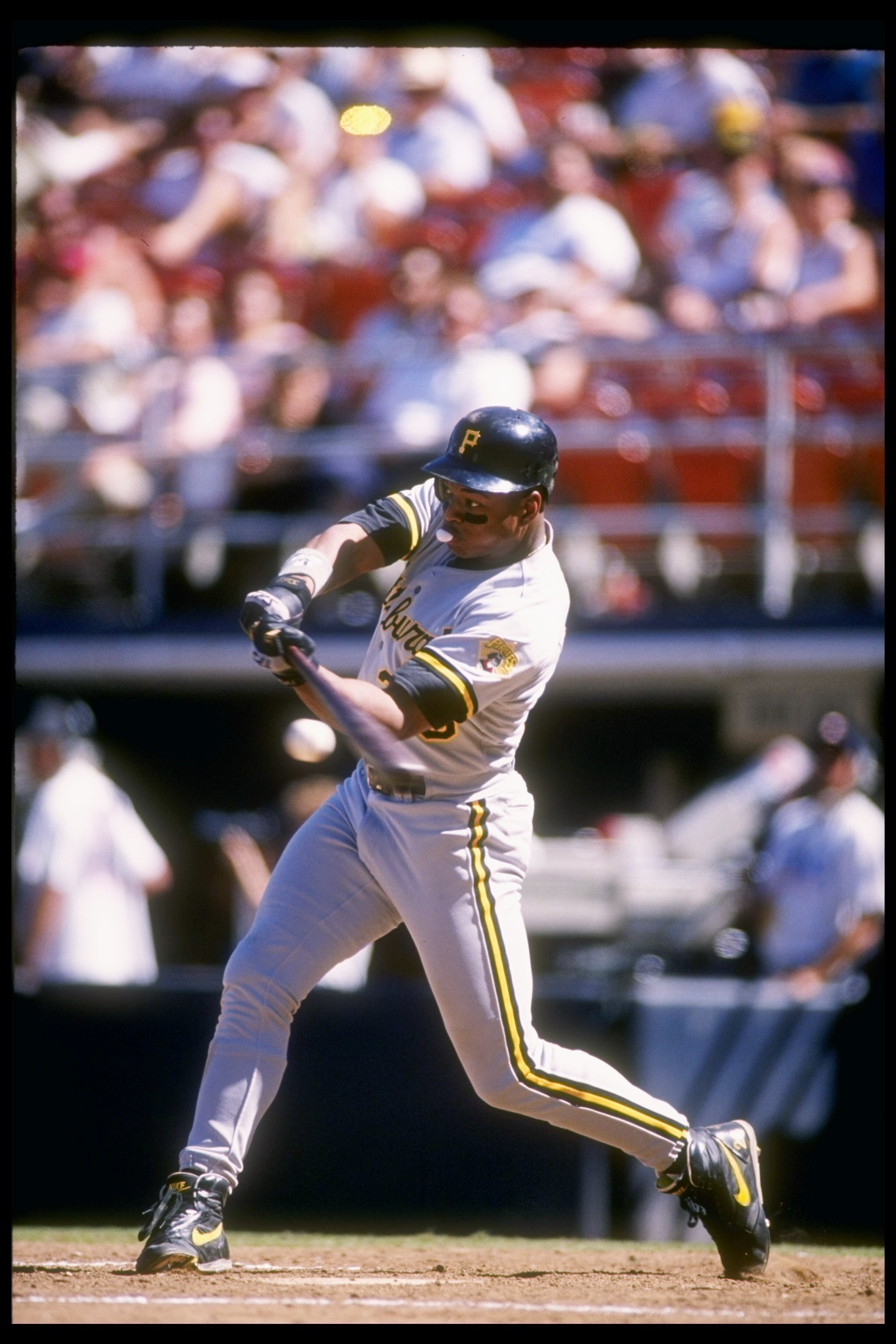 22 Aug 1993:  Left fielder Al Martin of the Pittsburgh Pirates swings at the ball during a game against the San Diego Padres at Jack Murphy Stadium in San Diego, California. Mandatory Credit: Stephen Dunn  /Allsport