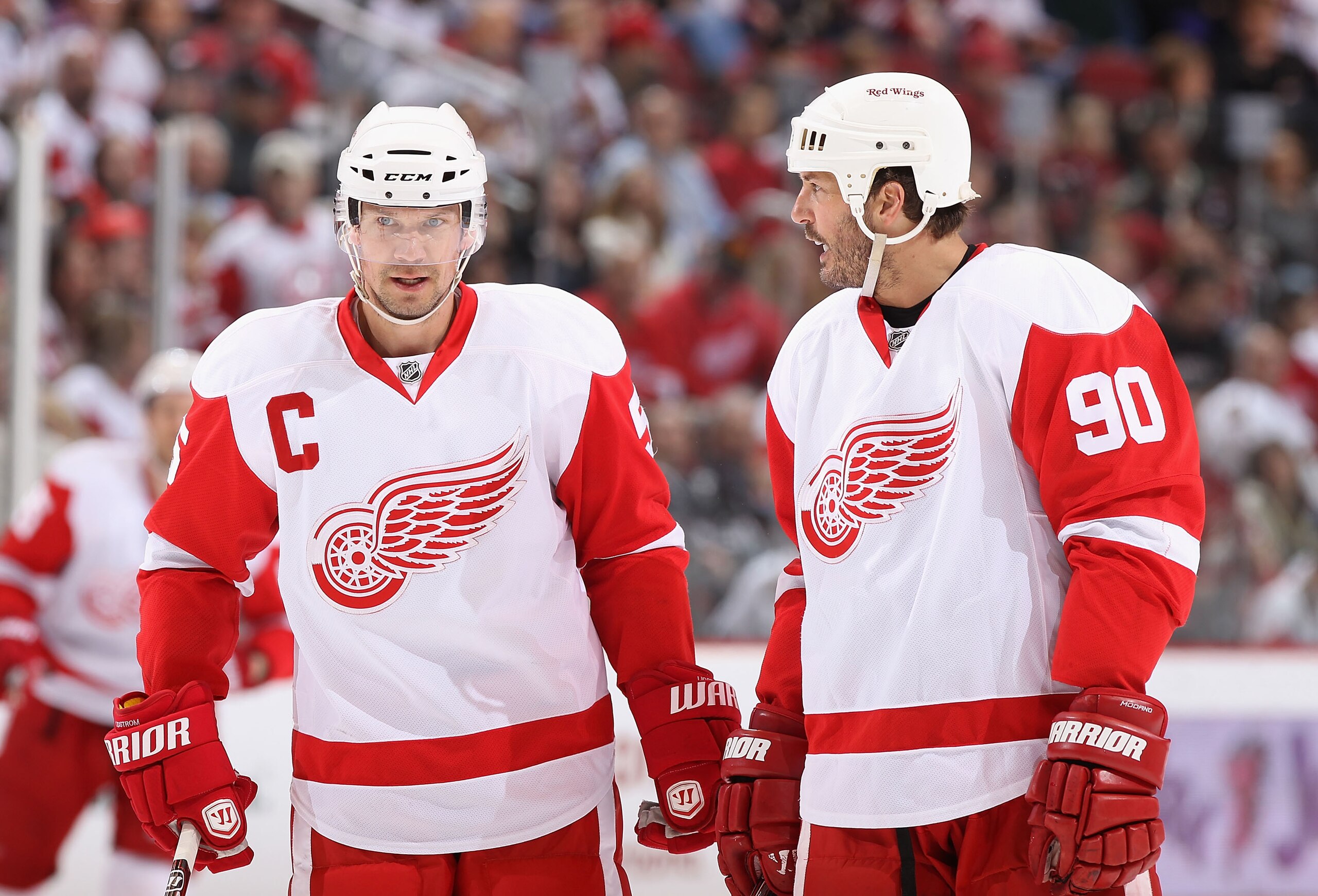 GLENDALE, AZ - MARCH 05: Nicklas Lidstrom #5 and Mike Modano #90 of the Detroit Red Wings talk during the NHL game against the Phoenix Coyotes at Jobing.com Arena on March 5, 2011 in Glendale, Arizona. The Coyotes defeated the Red Wings 5-4 in an overtim GLENDALE, AZ - MARCH 05: Nicklas Lidstrom #5 and Mike Modano #90 of the Detroit Red Wings talk during the NHL game against the Phoenix Coyotes at Jobing.com Arena on March 5, 2011 in Glendale, Arizona. The Coyotes defeated the Red Wings 5-4 in an overtim
