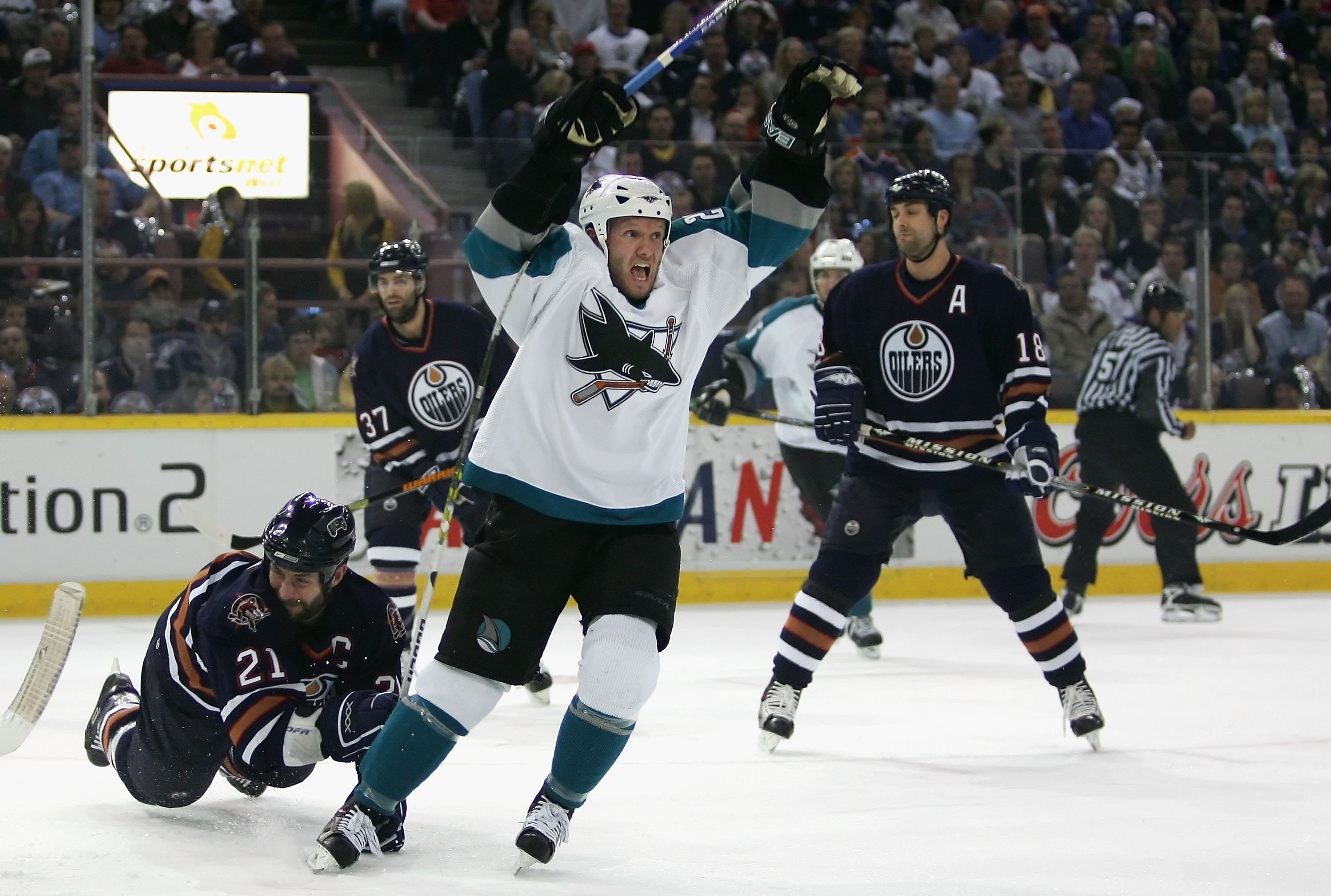 EDMONTON, AB - MAY 12:  Nils Ekman #28 of the San Jose Sharks celebrates after scoring against the Edmonton Oilers in the first period of game four of the Western Conference Semifinals at Rexall Place on May 12, 2006 in Edmonton, Alberta, Canada.   (Photo