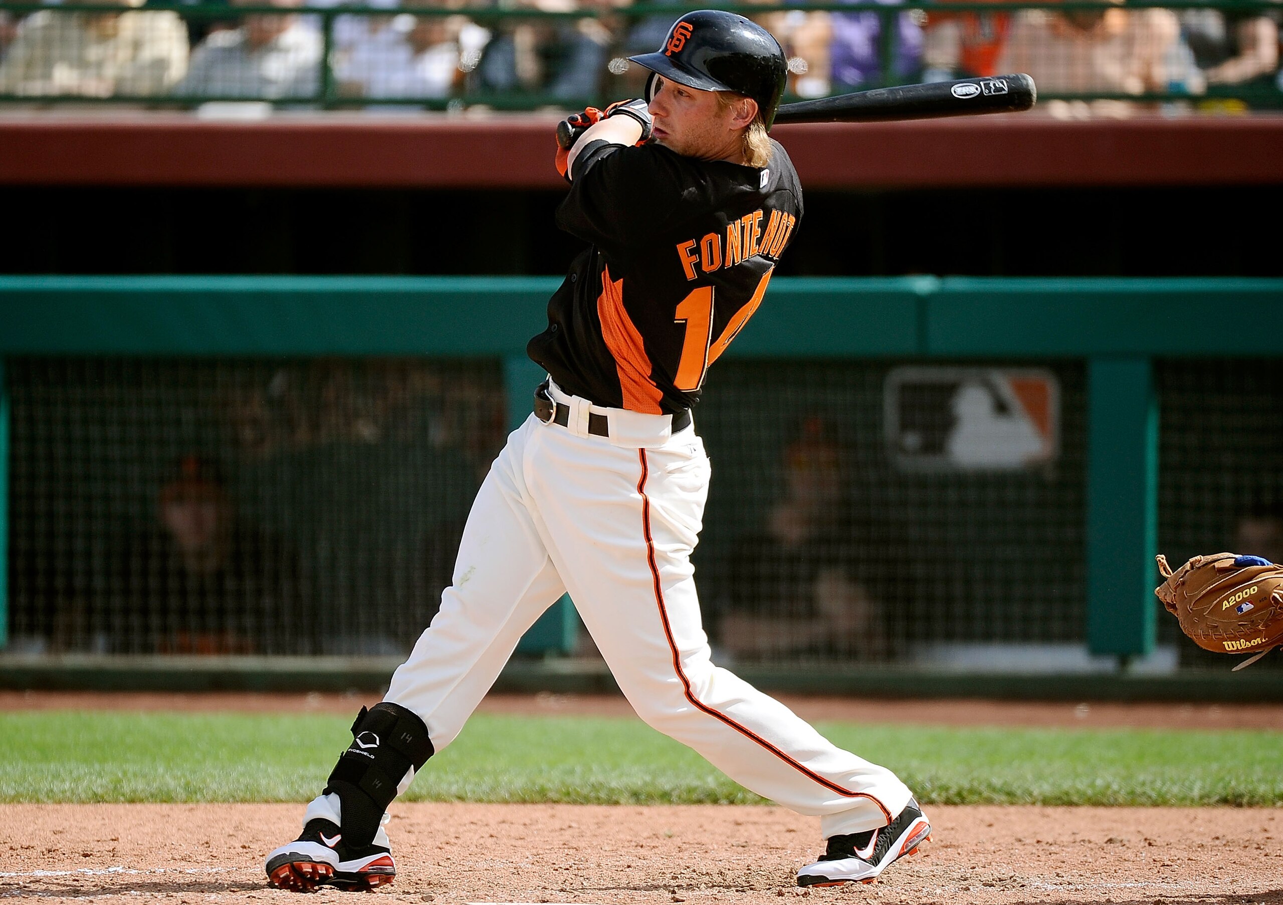 SCOTTSDALE, AZ - MARCH 18:  Mike Fontenot #14 of the San Francisco Giants at bat against the Los Angeles Dodgers during the baseball game at Scottsdale Stadium on March 18, 2011 in Scottsdale, Arizona.  (Photo by Kevork Djansezian/Getty Images)