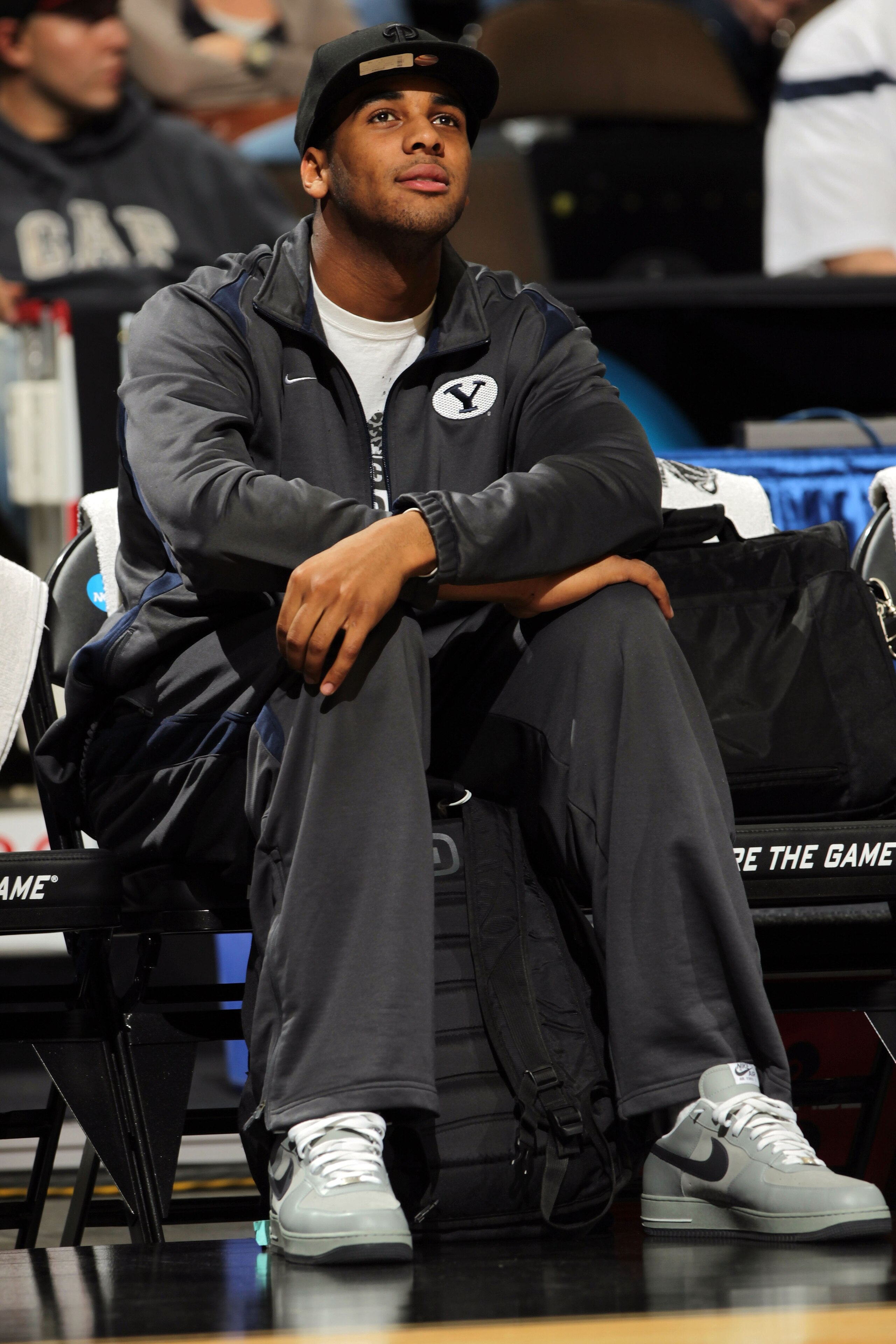 DENVER, CO - MARCH 16: Brandon Davies of the Brigham Young Cougars looks on during practice prior to his teams second round NCAA Men's Basketball Tournament game at the Pepsi Center on March 16, 2011 in Denver, Colorado. Davies was suspended early in the DENVER, CO - MARCH 16: Brandon Davies of the Brigham Young Cougars looks on during practice prior to his teams second round NCAA Men's Basketball Tournament game at the Pepsi Center on March 16, 2011 in Denver, Colorado. Davies was suspended early in the