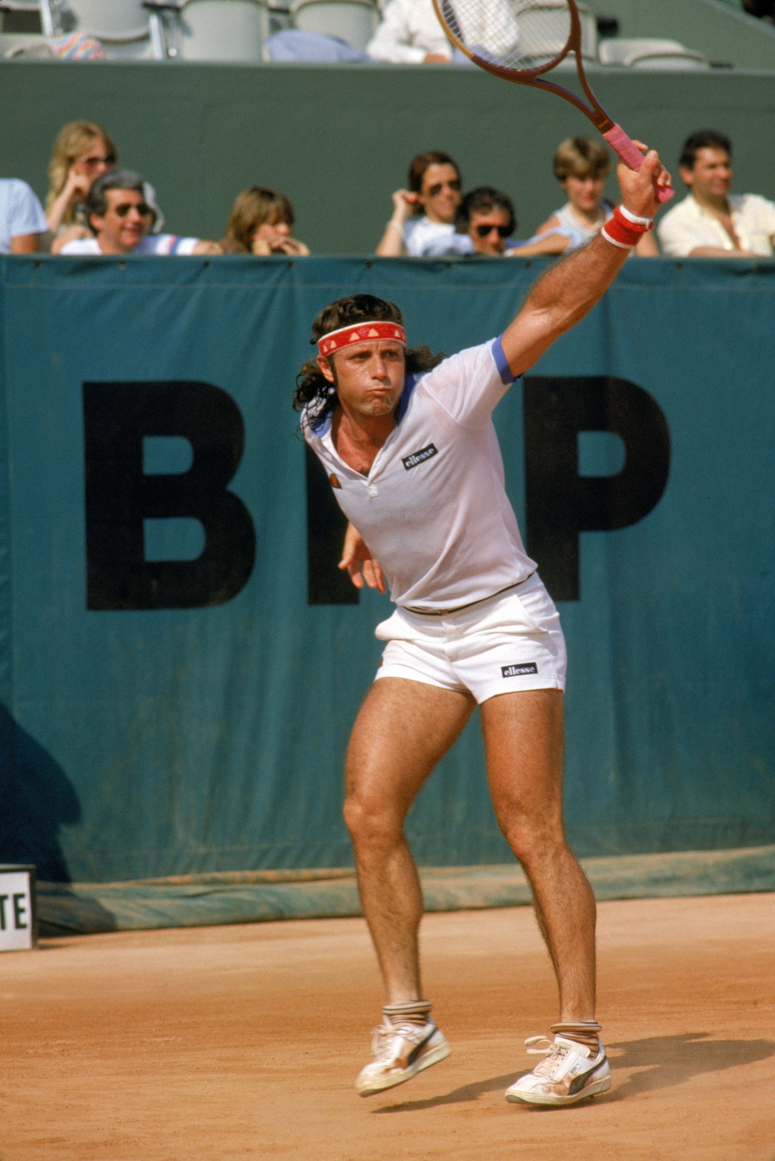 PARIS - 1982:  Guillermo Vilas of Argentina follows through on his backhand during a match in the 1982 French Open at the Stade Roland Garros in Paris, France.  (Photo by Steve Powell/Getty Images)