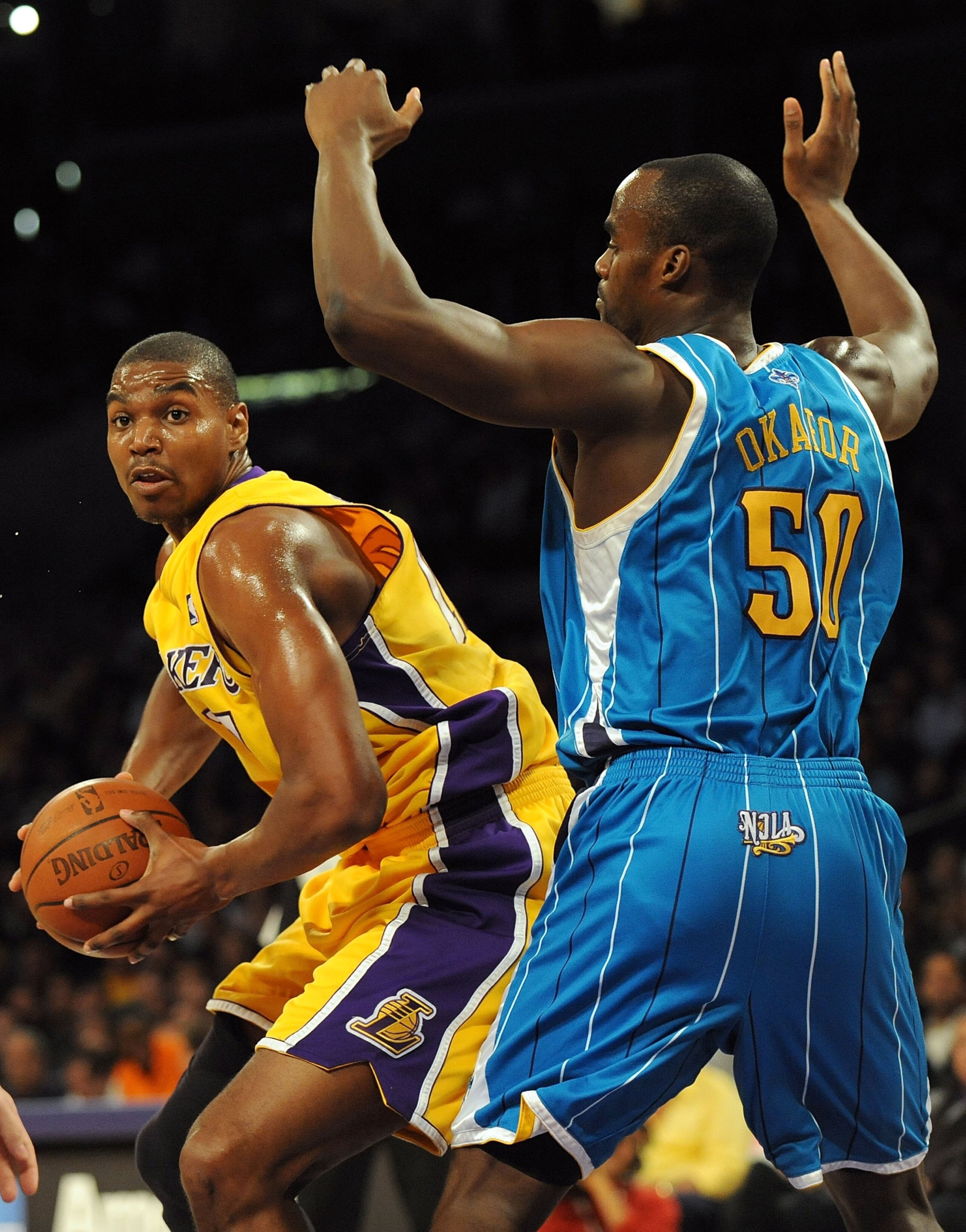 LOS ANGELES, CA - DECEMBER 01: Andrew Bynum #17 of the Los Angeles Lakers turns to the basket in front of Emeka Okafor #50 of the New Orleans Hornets at Staples Center on December 1, 2009 in Los Angeles, California. (Photo by Harry How/Getty Images) NOT LOS ANGELES, CA - DECEMBER 01: Andrew Bynum #17 of the Los Angeles Lakers turns to the basket in front of Emeka Okafor #50 of the New Orleans Hornets at Staples Center on December 1, 2009 in Los Angeles, California. (Photo by Harry How/Getty Images) NOT