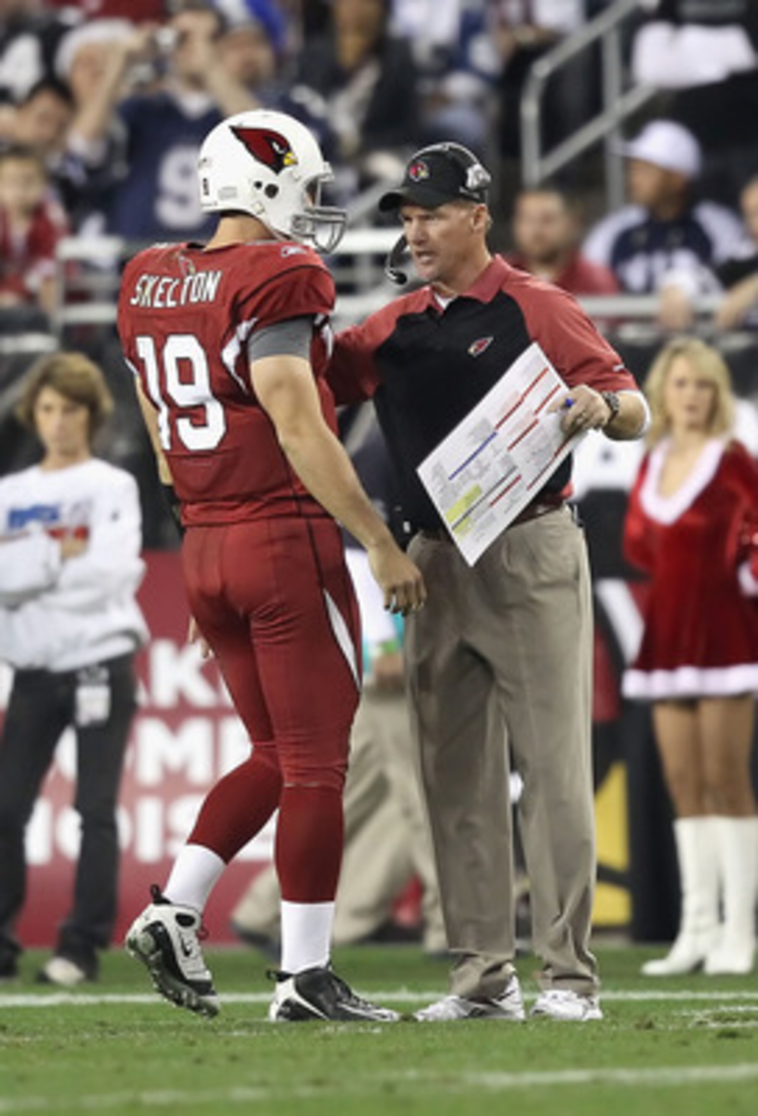 GLENDALE, AZ - DECEMBER 25: Head coach Ken Whisenhunt of the Arizona Cardinals talks with quarterback John Skelton #19 during the NFL game against the Dallas Cowboys at the University of Phoenix Stadium on December 25, 2010 in Glendale, Arizona. The Card GLENDALE, AZ - DECEMBER 25: Head coach Ken Whisenhunt of the Arizona Cardinals talks with quarterback John Skelton #19 during the NFL game against the Dallas Cowboys at the University of Phoenix Stadium on December 25, 2010 in Glendale, Arizona. The Card