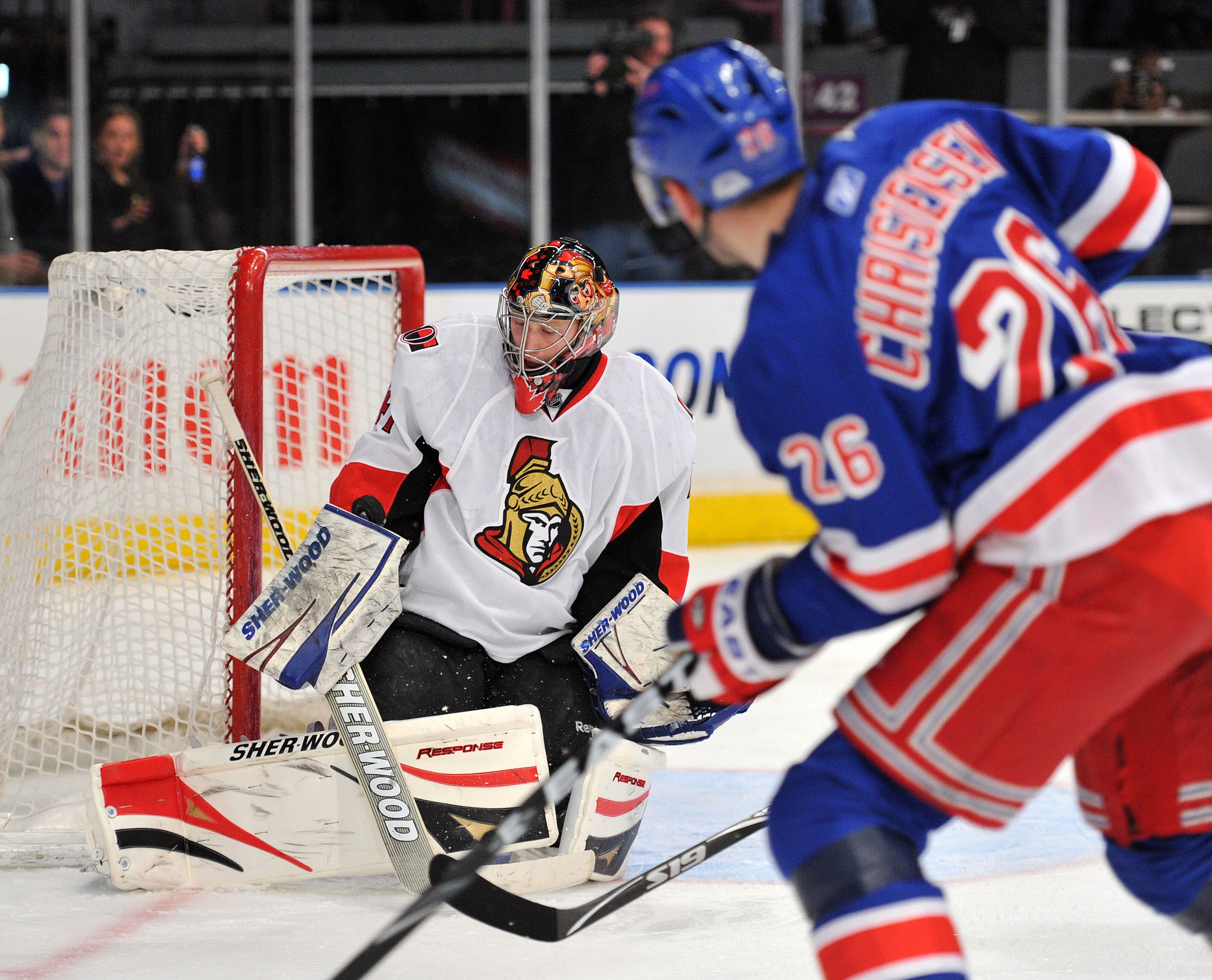 NEW YORK, NY - MARCH 24: Craig Anderson #41 of the Ottawa Senators makes a pad save on a shot on goal by Erik Christensen #26 of the New York Rangers at Madison Square Garden on March 24, 2011 in New York City. (Photo by Christopher Pasatieri/Getty Images