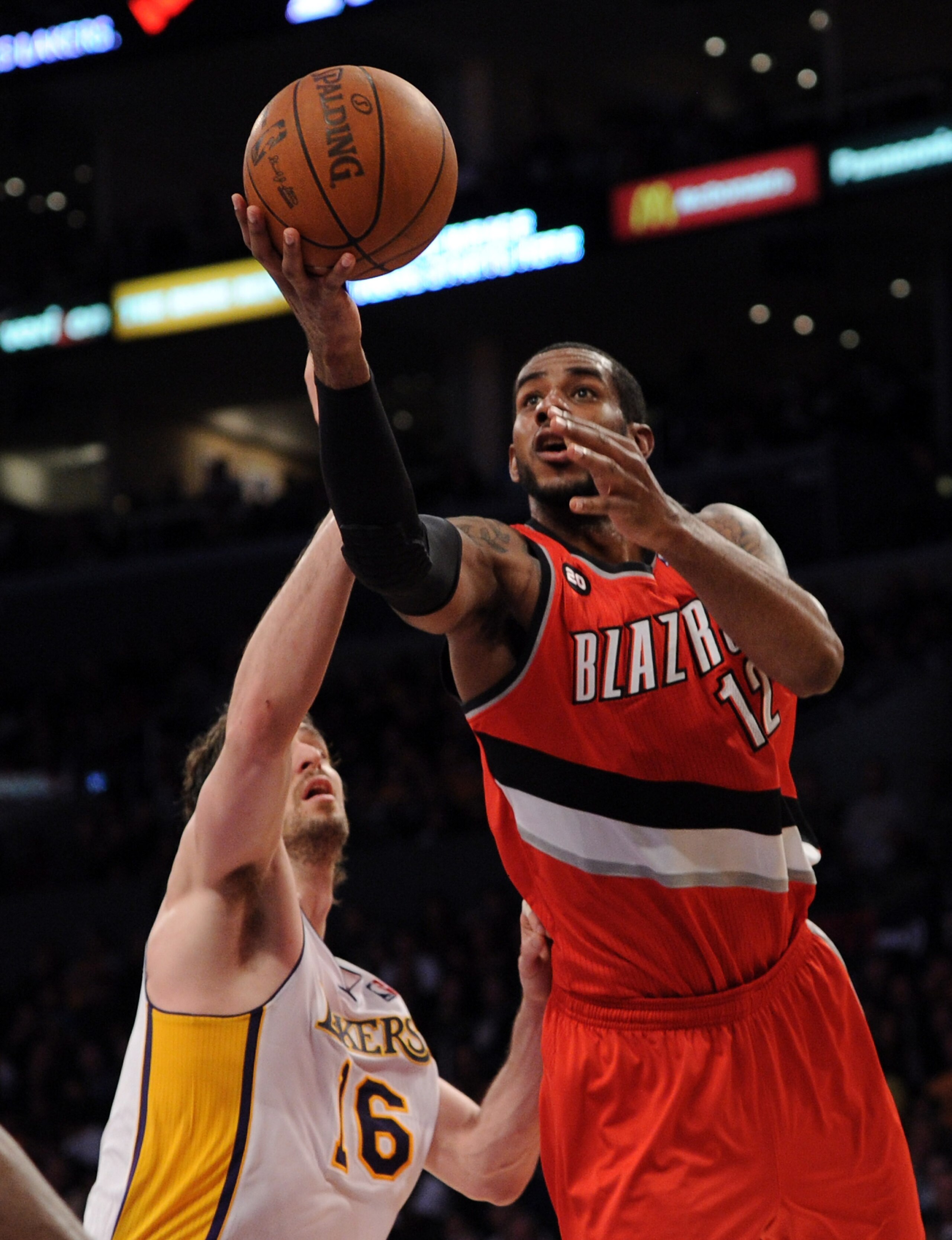 LOS ANGELES, CA - MARCH 20: LaMarcus Aldridge #12 of the Portland Trail Blazers goes in for a layup in front of Pau Gasol #16 of the Los Angeles Lakers at the Staples Center on March 20, 2011 in Los Angeles, California. NOTE TO USER: User expressly ackn LOS ANGELES, CA - MARCH 20: LaMarcus Aldridge #12 of the Portland Trail Blazers goes in for a layup in front of Pau Gasol #16 of the Los Angeles Lakers at the Staples Center on March 20, 2011 in Los Angeles, California. NOTE TO USER: User expressly ackn
