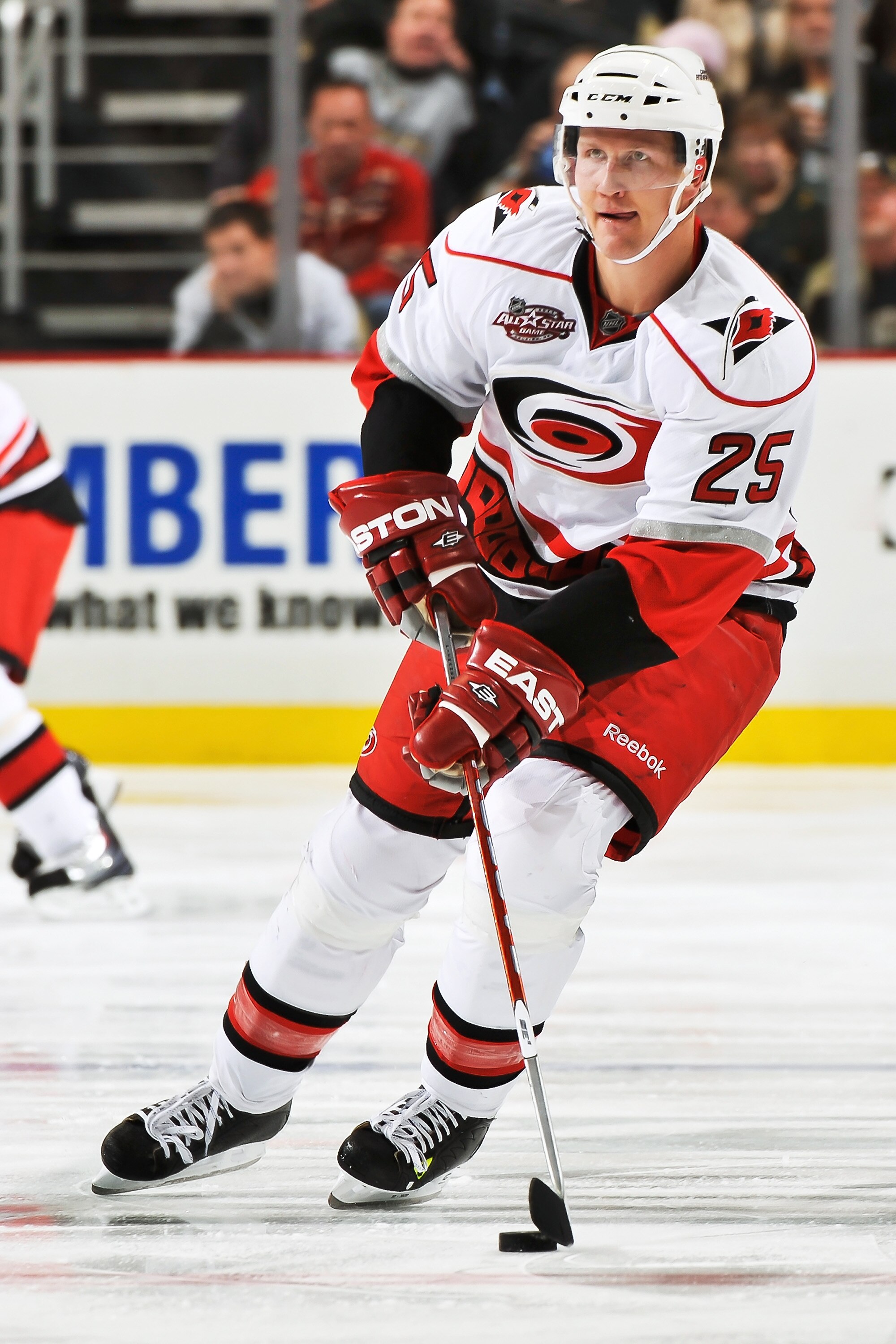 PITTSBURGH - NOVEMBER 19:  Joni Pitkanen #25 of the Carolina Hurricanes skates with the puck against the Pittsburgh Penguins on November 19, 2010 at Consol Energy Center in Pittsburgh, Pennsylvania.  (Photo by Jamie Sabau/Getty Images)