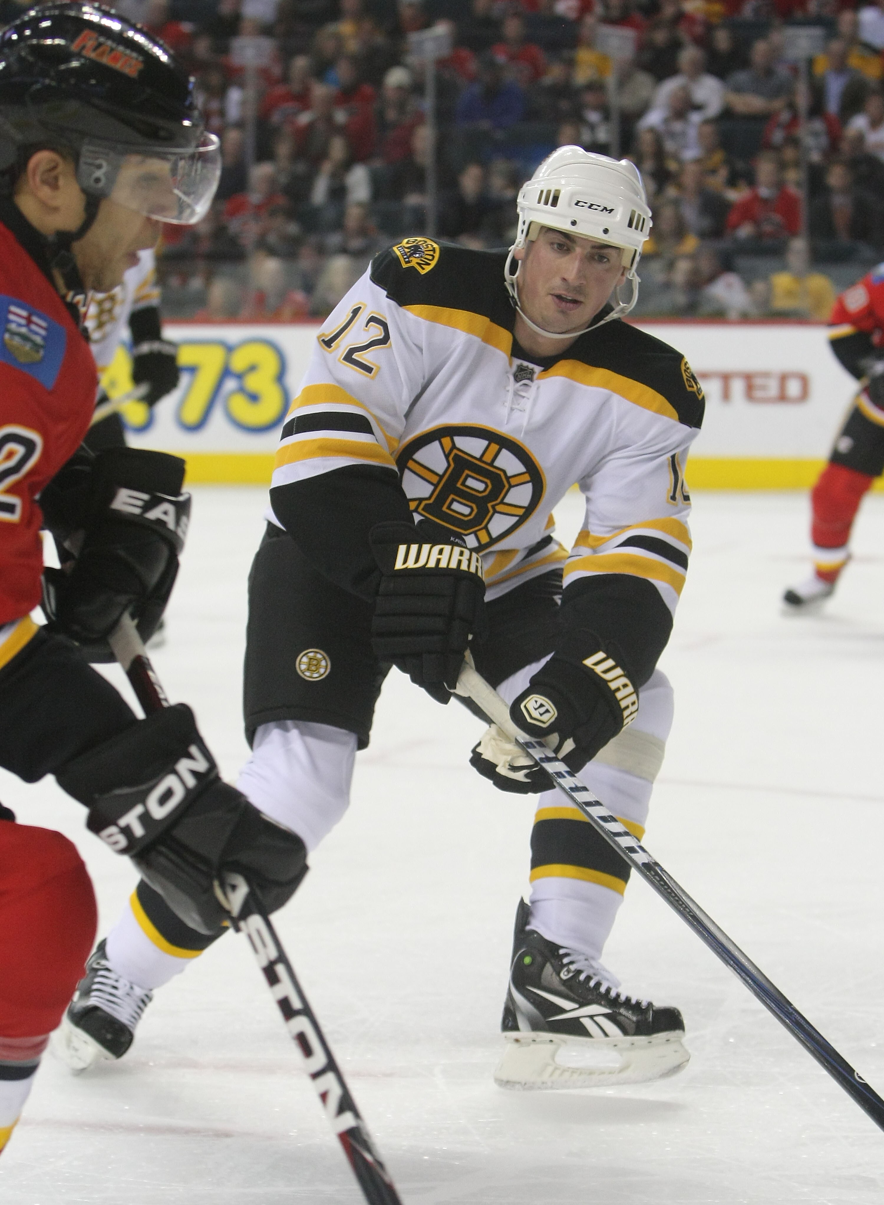 CALGARY,CANADA - FEBRUARY 22:  Tomas Kaberle #12 of the Boston Bruins skates against the Calgary Flames during their NHL game at Scotiabank Saddledome, February 22,2011 in Calgary, Alberta, Canada.(Photo By Dave Sandford/Getty Images)
