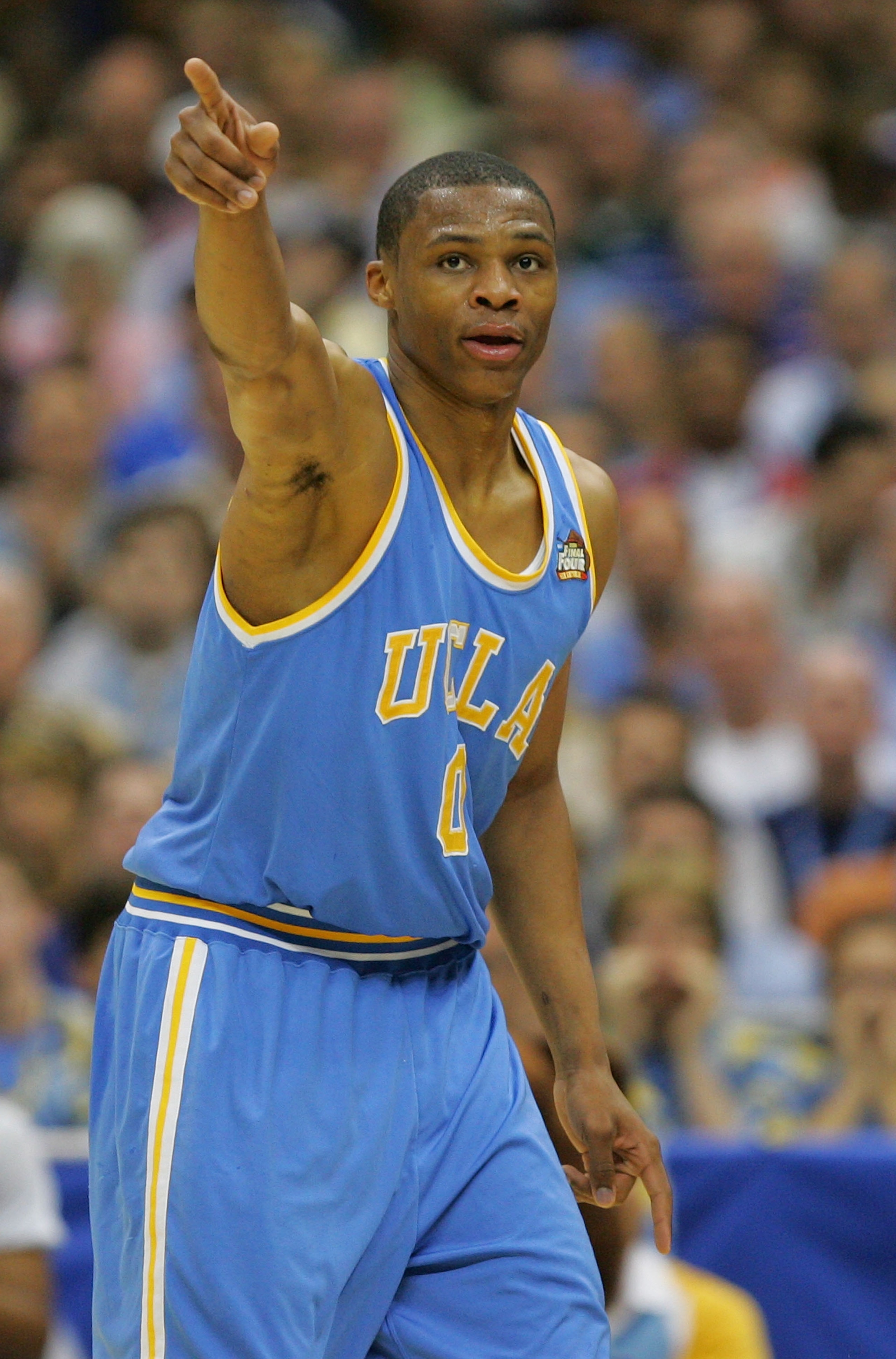 SAN ANTONIO - APRIL 05: Russell Westbrook #0 of the UCLA Bruins points upcourt against the Memphis Tigers in the first half during the National Semifinal game of the NCAA Men's Final Four at the Alamodome on April 5, 2008 in San Antonio, Texas. (Photo b SAN ANTONIO - APRIL 05: Russell Westbrook #0 of the UCLA Bruins points upcourt against the Memphis Tigers in the first half during the National Semifinal game of the NCAA Men's Final Four at the Alamodome on April 5, 2008 in San Antonio, Texas. (Photo b