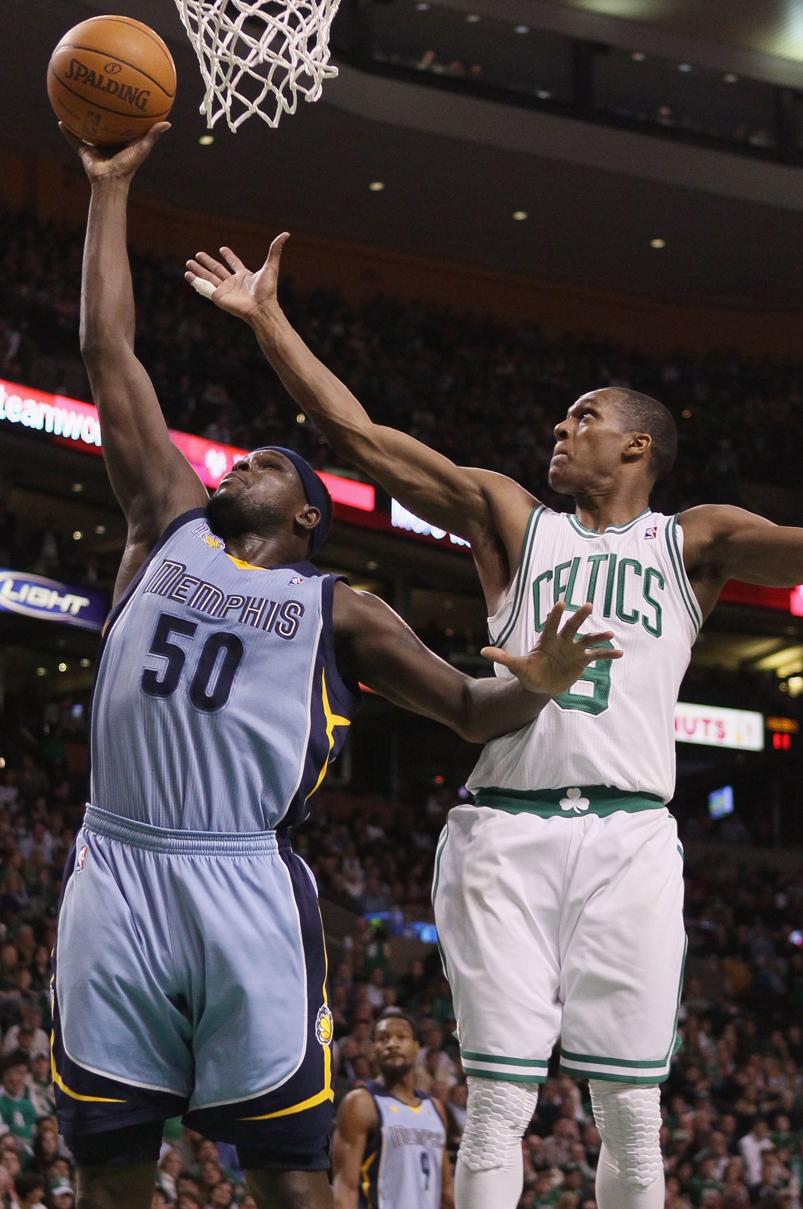 BOSTON, MA - MARCH 23: Zach Randolph #50 of the Memphis Grizzlies takes a shot as Rajon Rondo #9 of the Boston Celtics defends on March 23, 2011 at the TD Garden in Boston, Massachusetts. NOTE TO USER: User expressly acknowledges and agrees that, by dow BOSTON, MA - MARCH 23: Zach Randolph #50 of the Memphis Grizzlies takes a shot as Rajon Rondo #9 of the Boston Celtics defends on March 23, 2011 at the TD Garden in Boston, Massachusetts. NOTE TO USER: User expressly acknowledges and agrees that, by dow