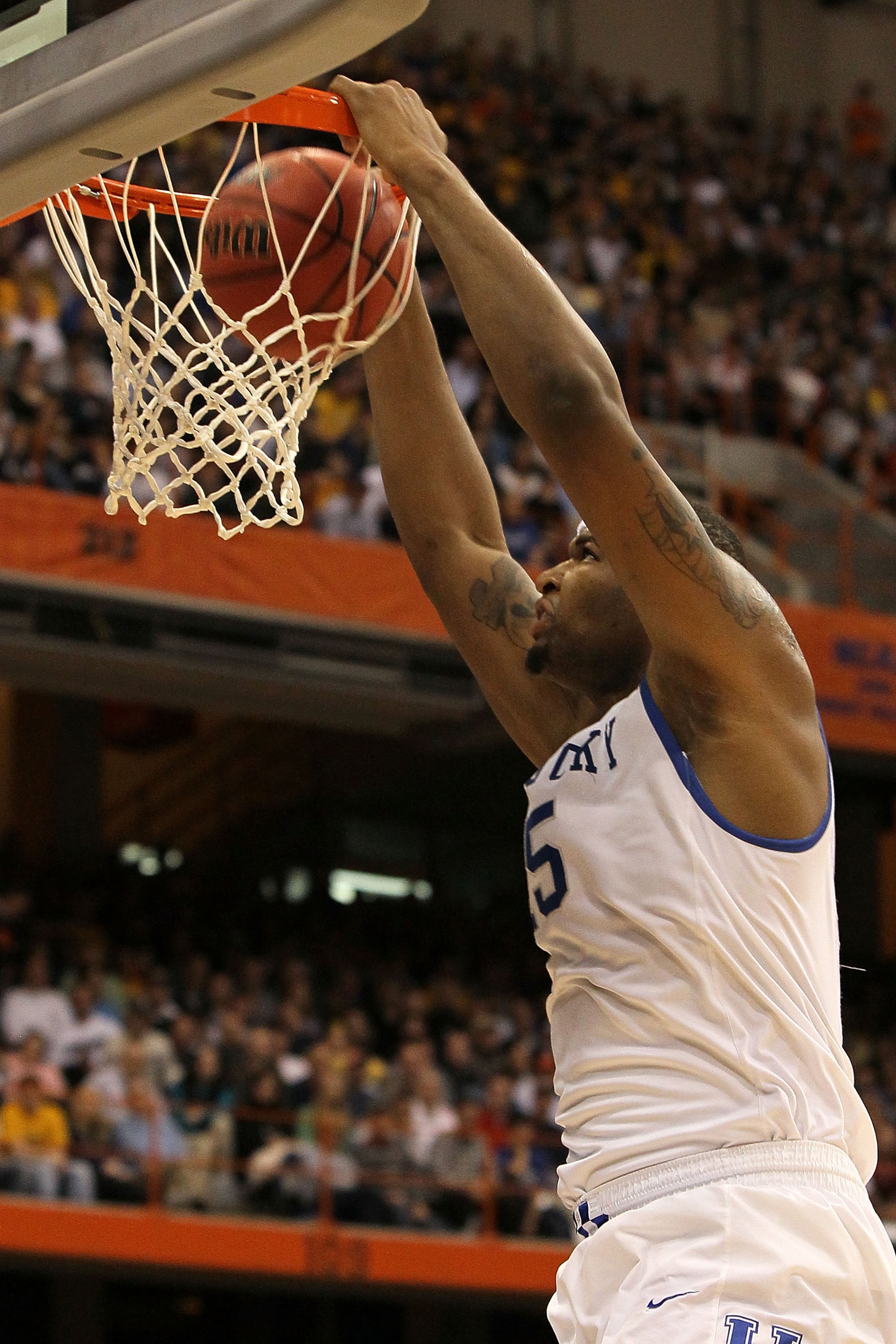 SYRACUSE, NY - MARCH 27: DeMarcus Cousins #15 of the Kentucky Wildcats dunks in the second half against the West Virginia Mountaineers during the east regional final of the 2010 NCAA men's basketball tournament at the Carrier Dome on March 27, 2010 in Sy SYRACUSE, NY - MARCH 27: DeMarcus Cousins #15 of the Kentucky Wildcats dunks in the second half against the West Virginia Mountaineers during the east regional final of the 2010 NCAA men's basketball tournament at the Carrier Dome on March 27, 2010 in Sy