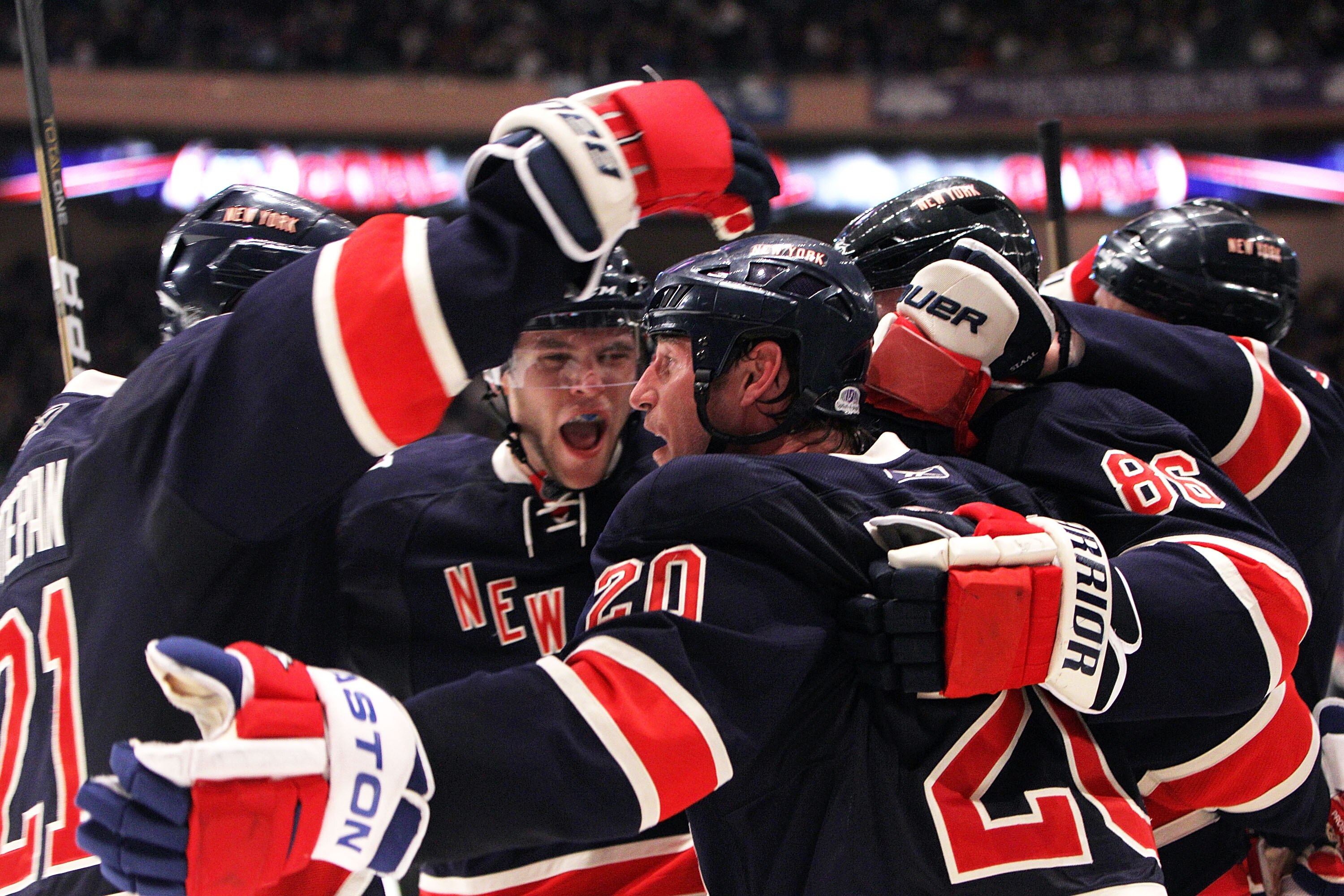 NEW YORK, NY - APRIL 04:  Vaclav Prospal #20 (R) of the New York Rangers scores his second goal of the game at 18:26 of the second period against the Boston Bruins and is joined by Wojtek Wolski #86 (L) at Madison Square Garden on April 4, 2011 in New Yor