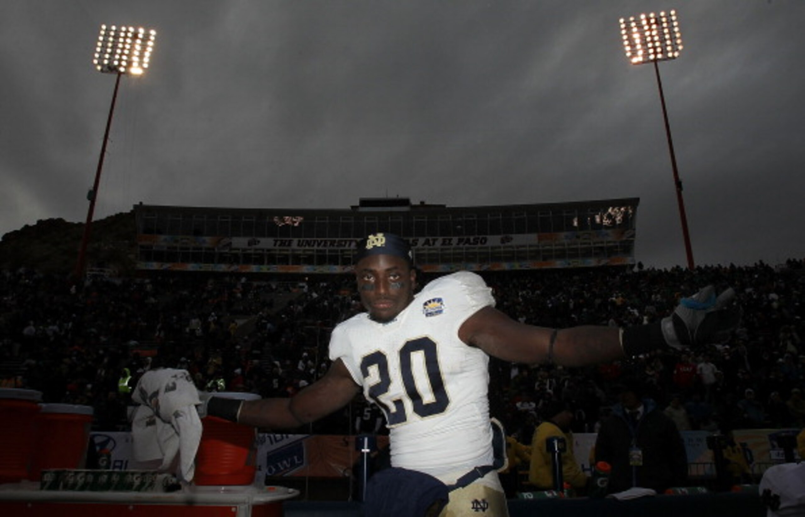 EL PASO, TX - DECEMBER 30:  Running back Cierre Wood #20 of the Notre Dame Fighting Irish celebrates a 33-17 win against the Miami Hurricanes at Sun Bowl on December 30, 2010 in El Paso, Texas.  (Photo by Ronald Martinez/Getty Images)