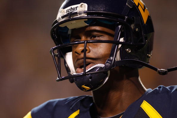 BATON ROUGE, LA - SEPTEMBER 25:  Quarterback Geno Smith #12 of the West Virginia Mountaineers in action against the Louisiana State University Tigers at Tiger Stadium on September 25, 2010 in Baton Rouge, Louisiana.  (Photo by Chris Graythen/Getty Images)