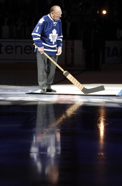 TORONTO, CANADA - OCTOBER 07: Leaf Hall of Famer Johnny Bower take part   in the pre-game ceremony before the Toronto Maple Leafs take on the Montreal Canadiens during a regular season NHL game at the Air Canada Centre October 7, 2010 in Toronto, Ontario,