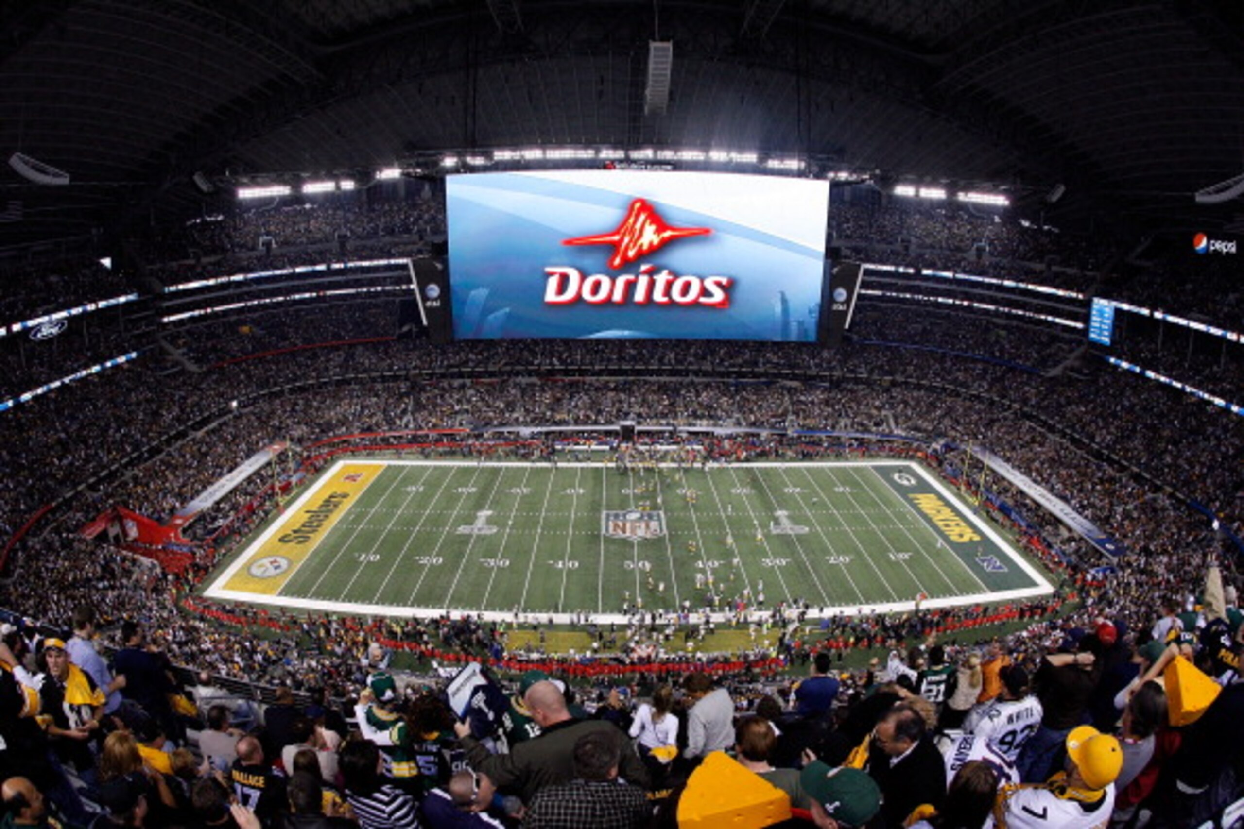 ARLINGTON, TX - FEBRUARY 06:  A Doritos ad is displayed on the screen during Super Bowl XLV at Cowboys Stadium on February 6, 2011 in Arlington, Texas.  (Photo by Tom Pennington/Getty Images)