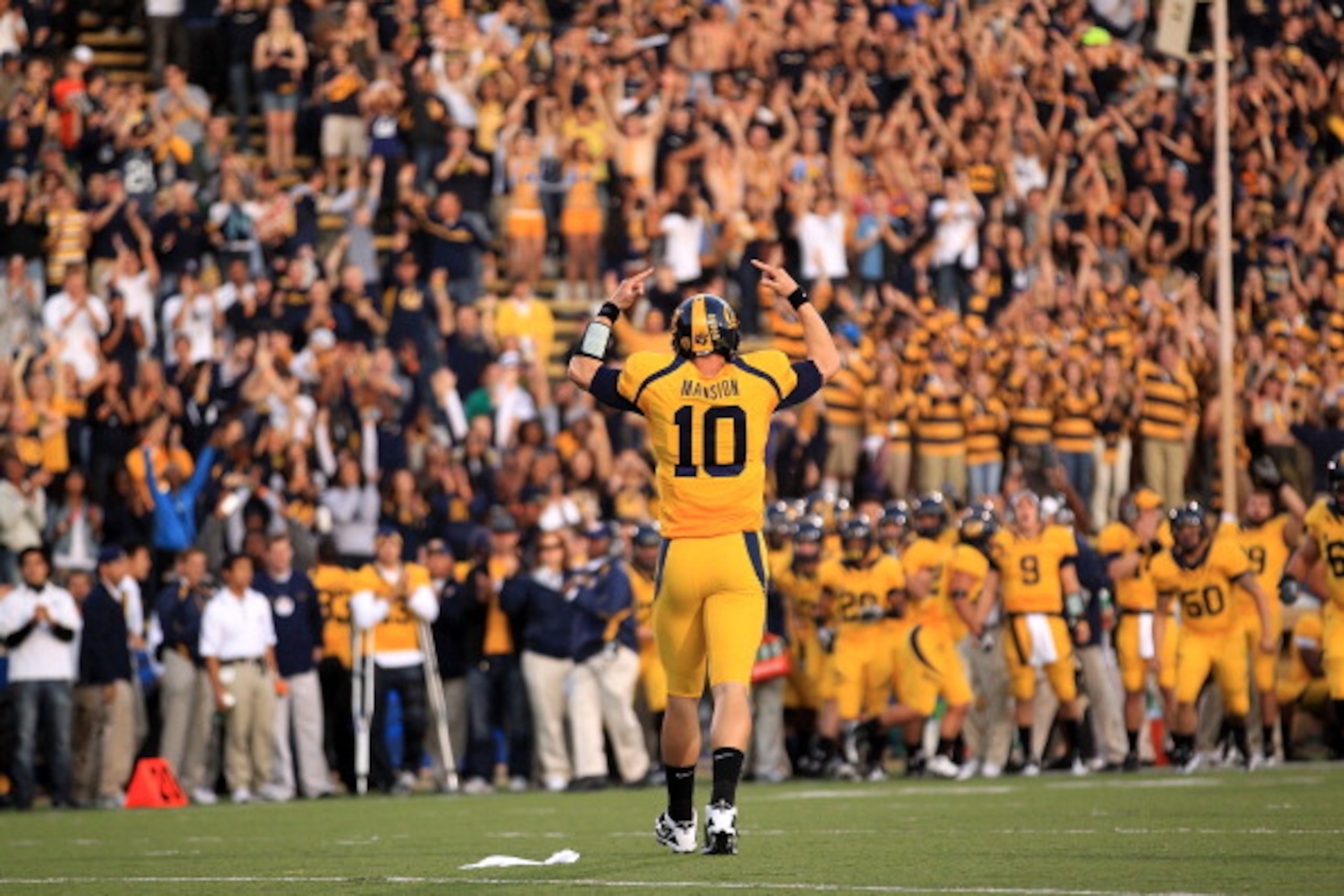 BERKELEY, CA - NOVEMBER 13:  Brock Mansion #10 of the California Golden Bears celebrates after they scored a touchdown against the Oregon Ducks at California Memorial Stadium on November 13, 2010 in Berkeley, California.  (Photo by Ezra Shaw/Getty Images)