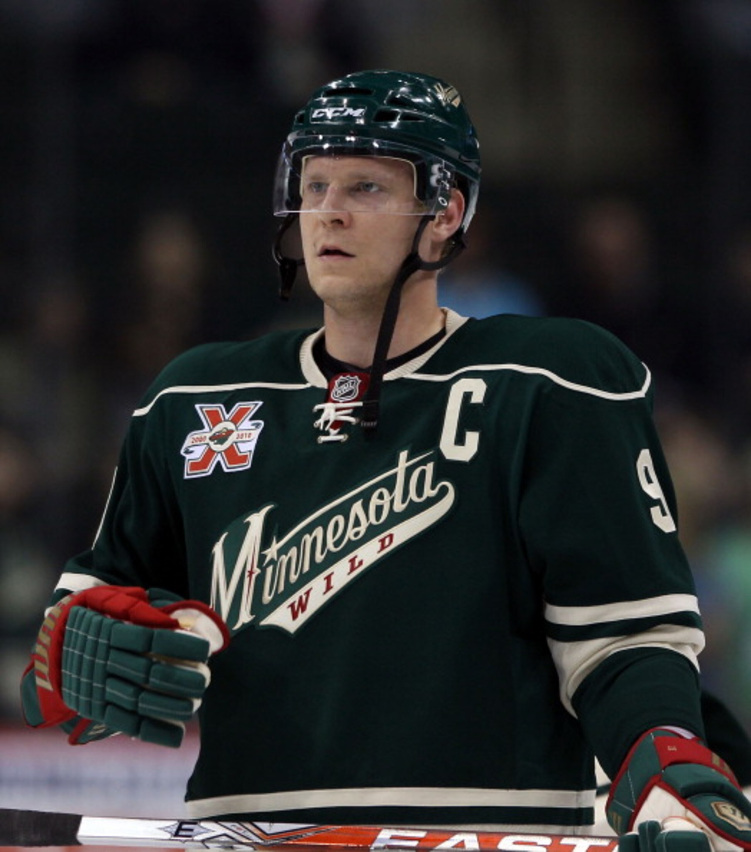ST PAUL, MN - MARCH 22:  Mikko Koivu #9 of the Minnesota Wild skates against the Toronto Maple Leafs at the Xcel Energy Center on March 22, 2011 in St Paul, Minnesota.  (Photo by Bruce Bennett/Getty Images)