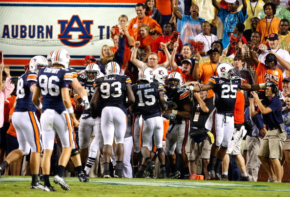 AUBURN, AL - SEPTEMBER 19:  Craig Stevens #46 of the Auburn Tigers celebrates his interception return for a touchdown in the final minutes of their 41-30 win over the West Virginia Mountaineers at Jordan-Hare Stadium on September 19, 2009 in Auburn, Alaba