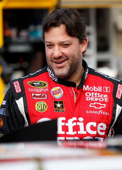 BRISTOL, TN - MARCH 19: Tony Stewart, driver of the #14 Office Depot/Mobil 1 Chevrolet, stands on pit road prior to practice for the NASCAR Sprint Cup Series Jeff Byrd 500 Presented By Food City at Bristol Motor Speedway on March 19, 2011 in Bristol, Tenn