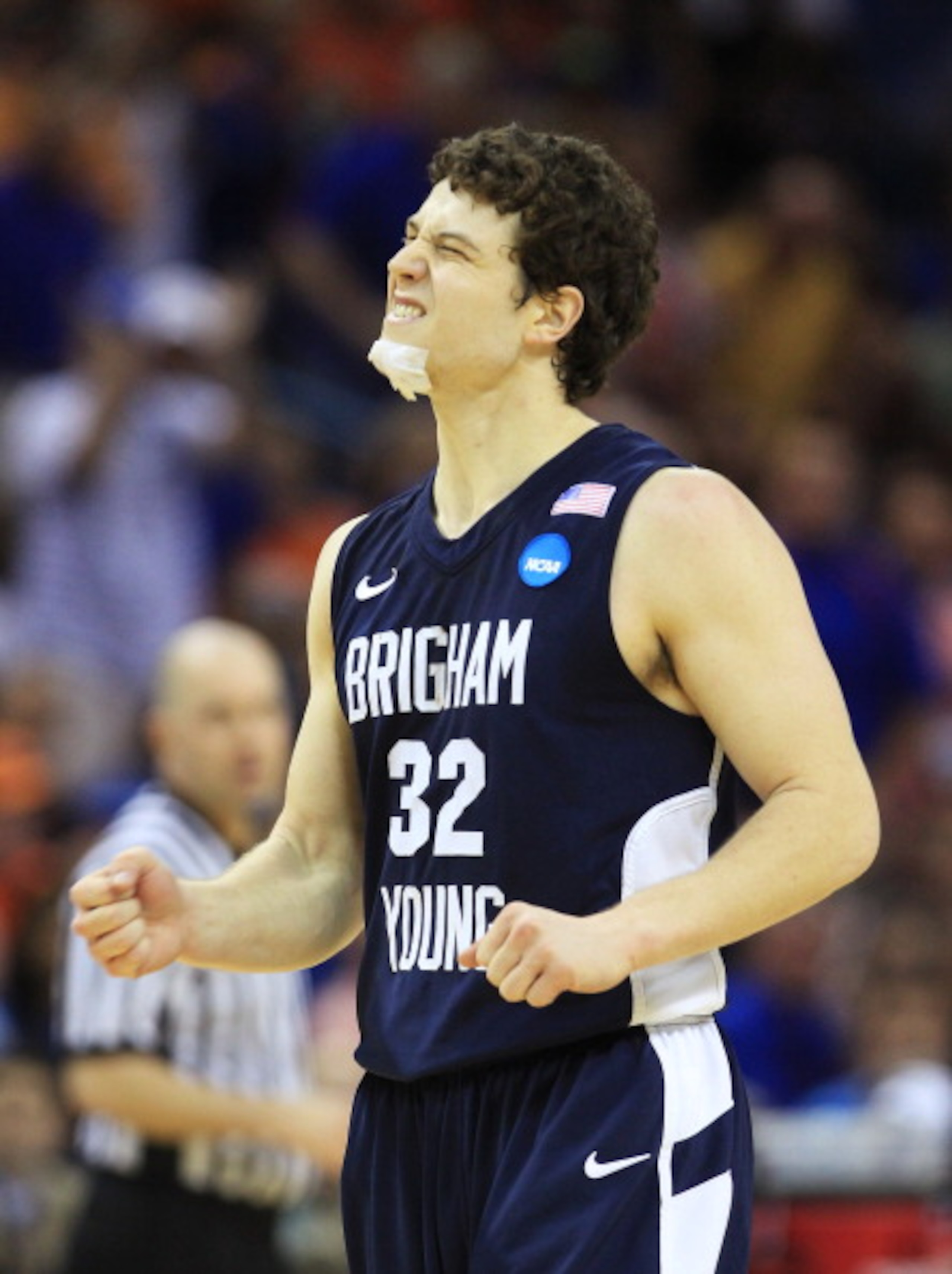 NEW ORLEANS, LA - MARCH 24:  Jimmer Fredette #32 of the Brigham Young Cougars reacts during their game against the Florida Gators in the Southeast regional of the 2011 NCAA men's basketball tournament at New Orleans Arena on March 24, 2011 in New Orleans,
