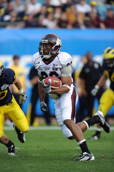 JACKSONVILLE, FL - JANUARY 01:  Michael Carr #86 of the Mississippi State Bulldogs scores on a 31 yard pass reception in the second half against the Michigan Wolverines during the Gator Bowl at EverBank Field on January 1, 2011 in Jacksonville, Florida  (