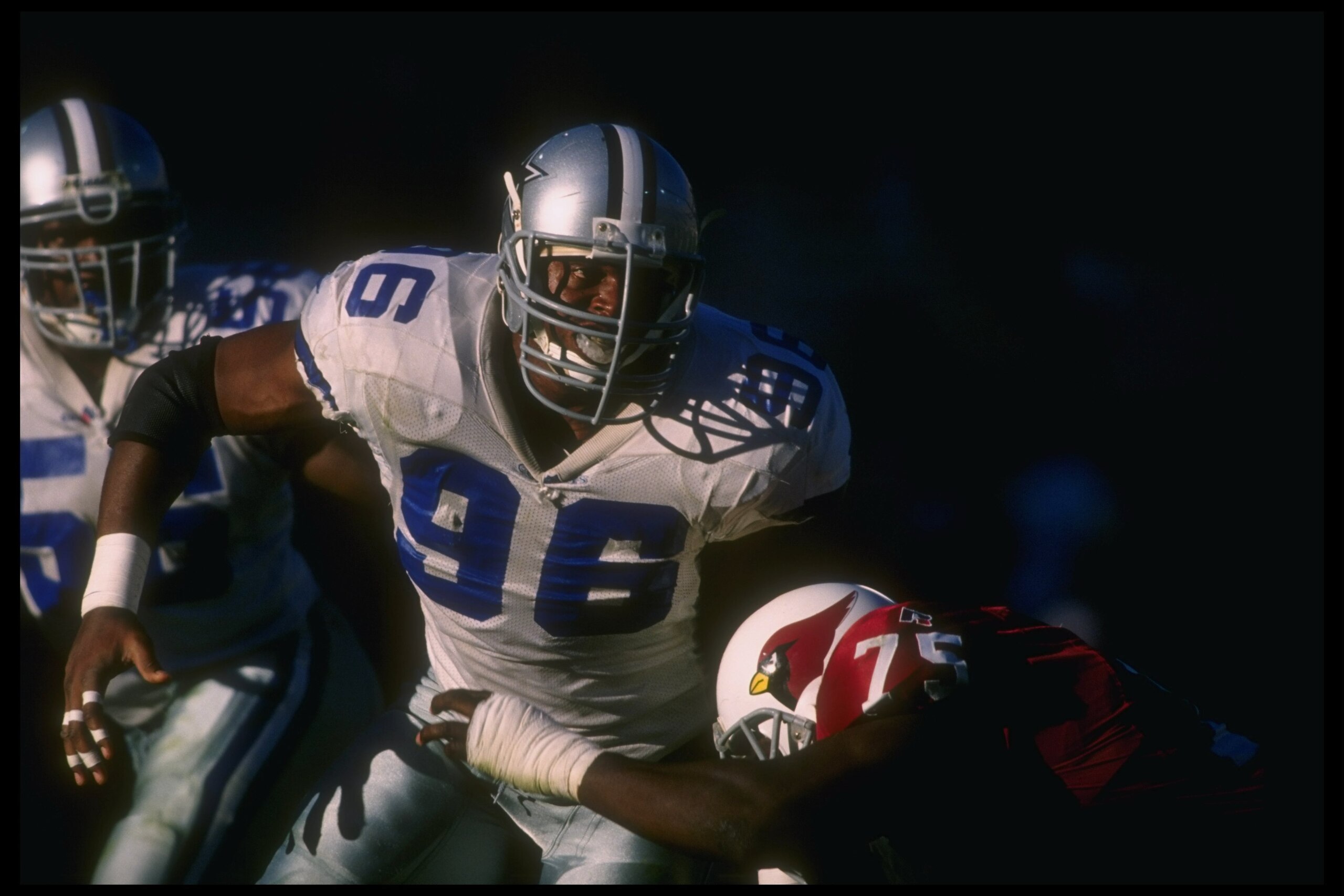 8 Dec 1996: Defensive lineman Shante Carver of the Dallas Cowboys works against Arizona Cardinals offensive lineman Lomas Brown (right) during a game at Sun Devil Stadium in Tempe, Arizona. The Cowboys won the game, 10-6. Mandatory Credit: Stephen Dunn 8 Dec 1996: Defensive lineman Shante Carver of the Dallas Cowboys works against Arizona Cardinals offensive lineman Lomas Brown (right) during a game at Sun Devil Stadium in Tempe, Arizona. The Cowboys won the game, 10-6. Mandatory Credit: Stephen Dunn