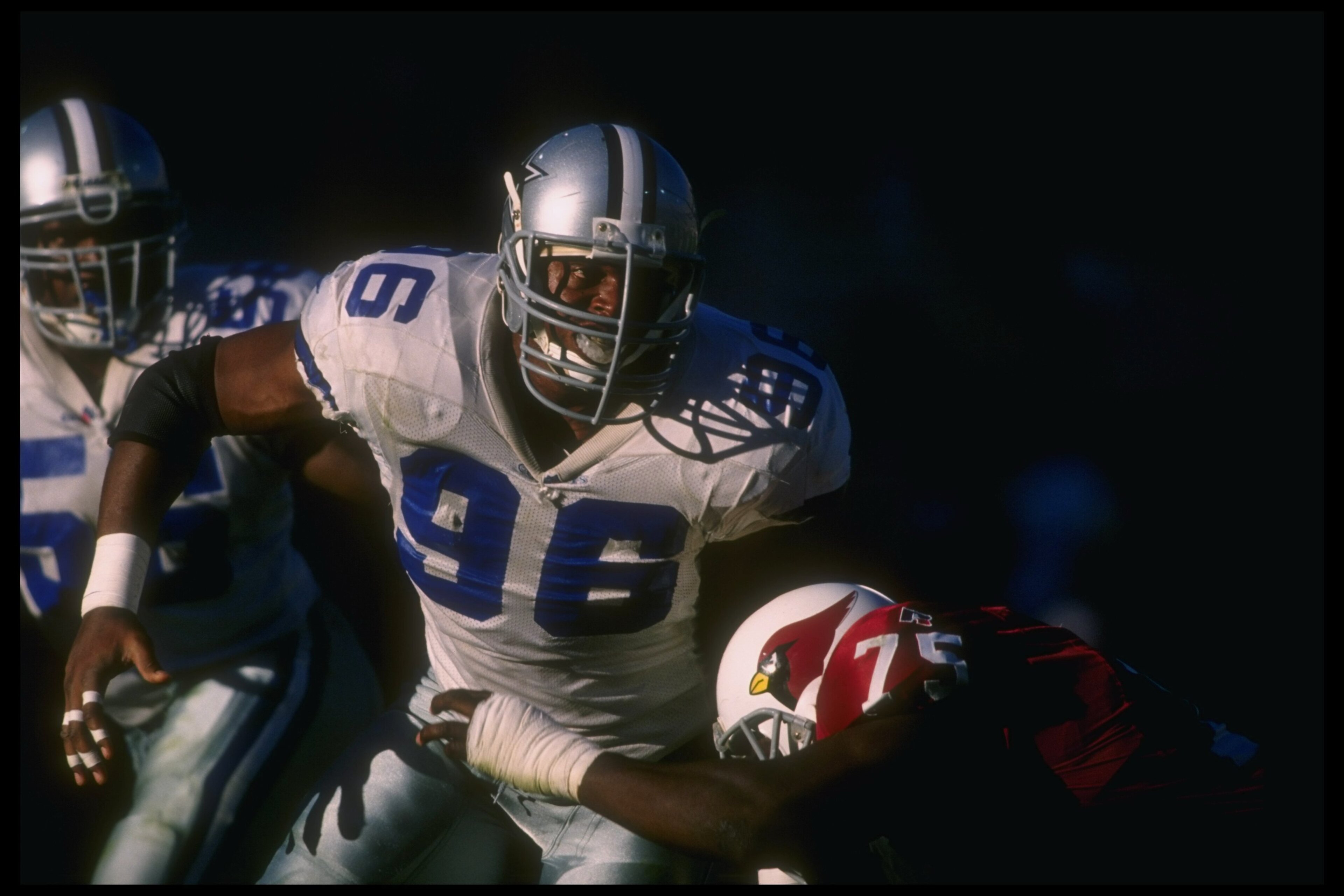 8 Dec 1996:  Defensive lineman Shante Carver of the Dallas Cowboys works against Arizona Cardinals offensive lineman Lomas Brown (right) during a game at Sun Devil Stadium in Tempe, Arizona.  The Cowboys won the game, 10-6. Mandatory Credit: Stephen Dunn