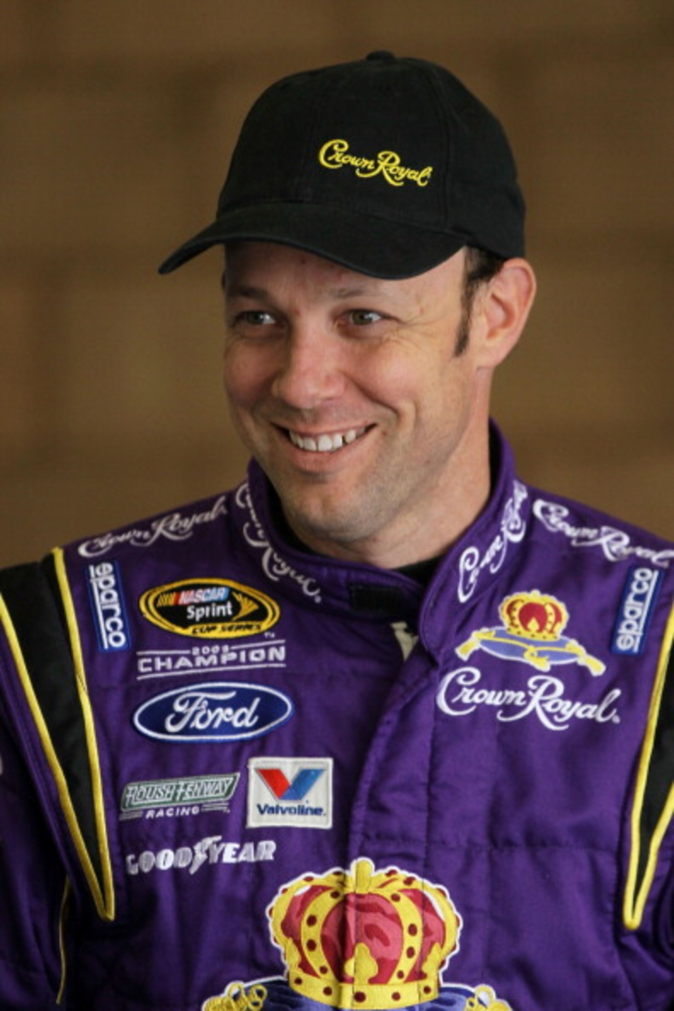 FONTANA, CA - MARCH 25:  Matt Kenseth, driver of the #17 Crown Royal Ford, stands in the garage area during practice for the NASCAR Sprint Cup Series Auto Club 400 at Auto Club Speedway on March 25, 2011 in Fontana, California.  (Photo by Jeff Gross/Getty