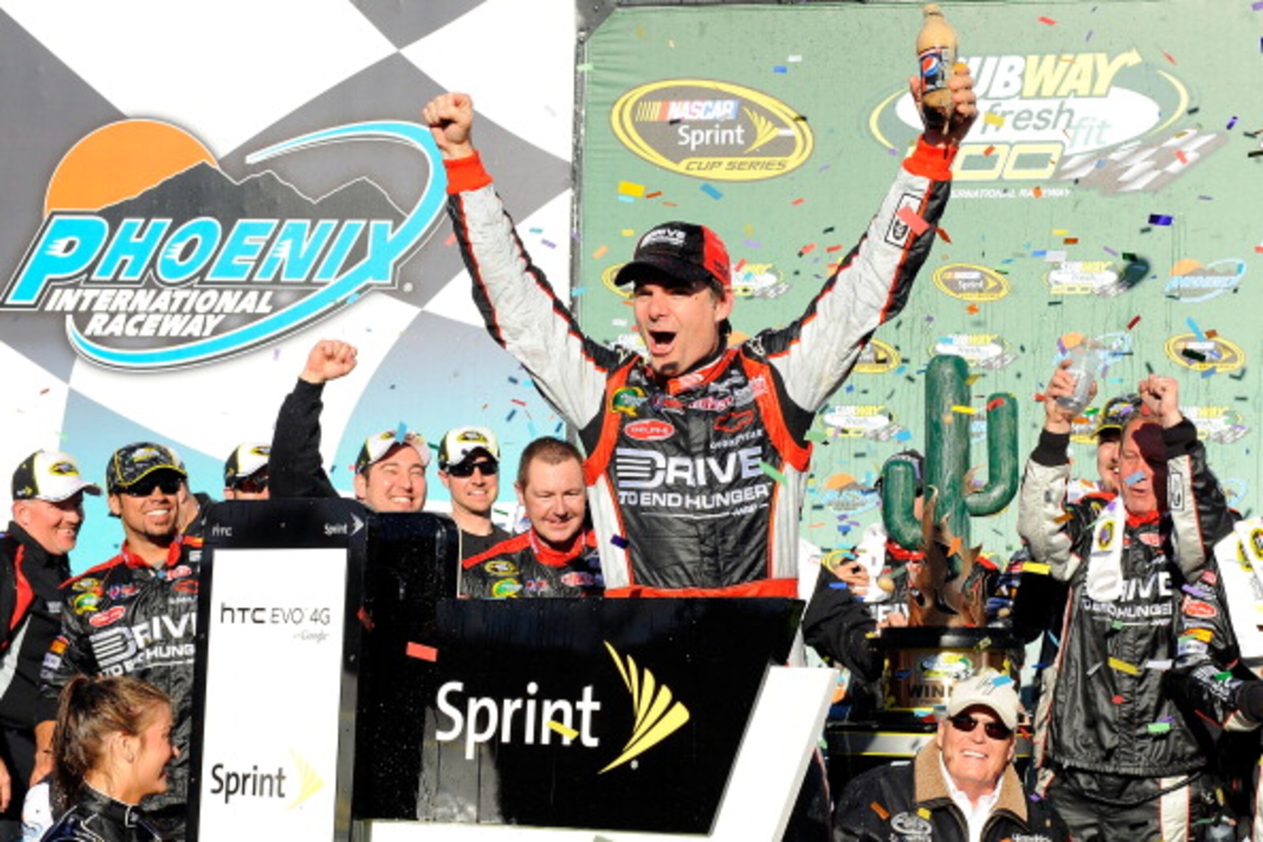 AVONDALE, AZ - FEBRUARY 27:  Jeff Gordon, driver of the #24 Drive to End Hunger Chevrolet, celebrates in victory lane after winning the NASCAR Sprint Cup Series Subway Fresh Fit 500 at Phoenix International Raceway on February 27, 2011 in Avondale, Arizon