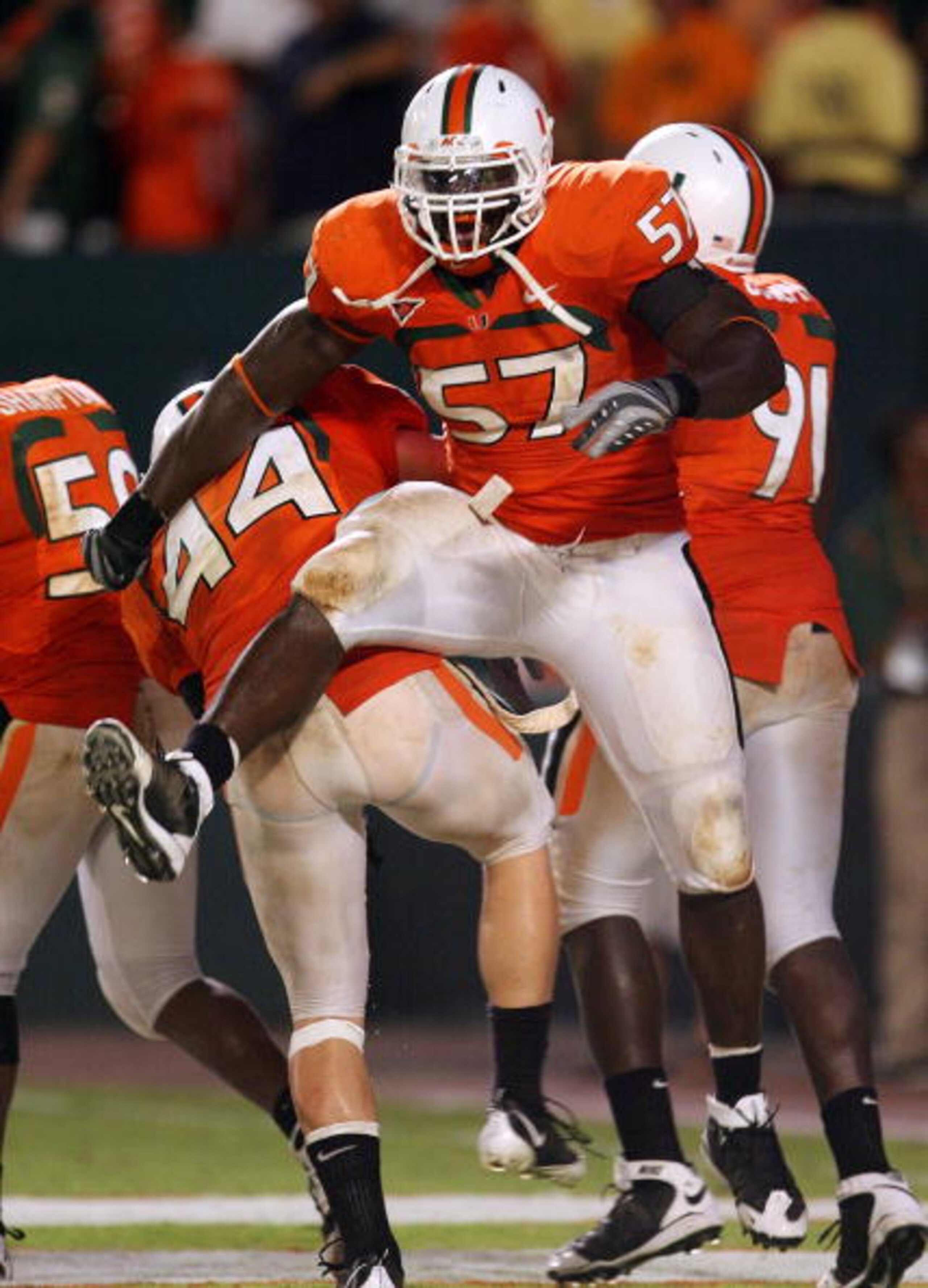FORT LAUDERDALE, FL - SEPTEMBER 17: Defensive lineman Allen Bailey #57 and linebacker Colin McCarthy #44 of the Miami Hurricanes celebrate after scoring a safety against the Georgia Tech Yellow Jackets at Land Shark Stadium on September 17, 2009 in Fort FORT LAUDERDALE, FL - SEPTEMBER 17: Defensive lineman Allen Bailey #57 and linebacker Colin McCarthy #44 of the Miami Hurricanes celebrate after scoring a safety against the Georgia Tech Yellow Jackets at Land Shark Stadium on September 17, 2009 in Fort