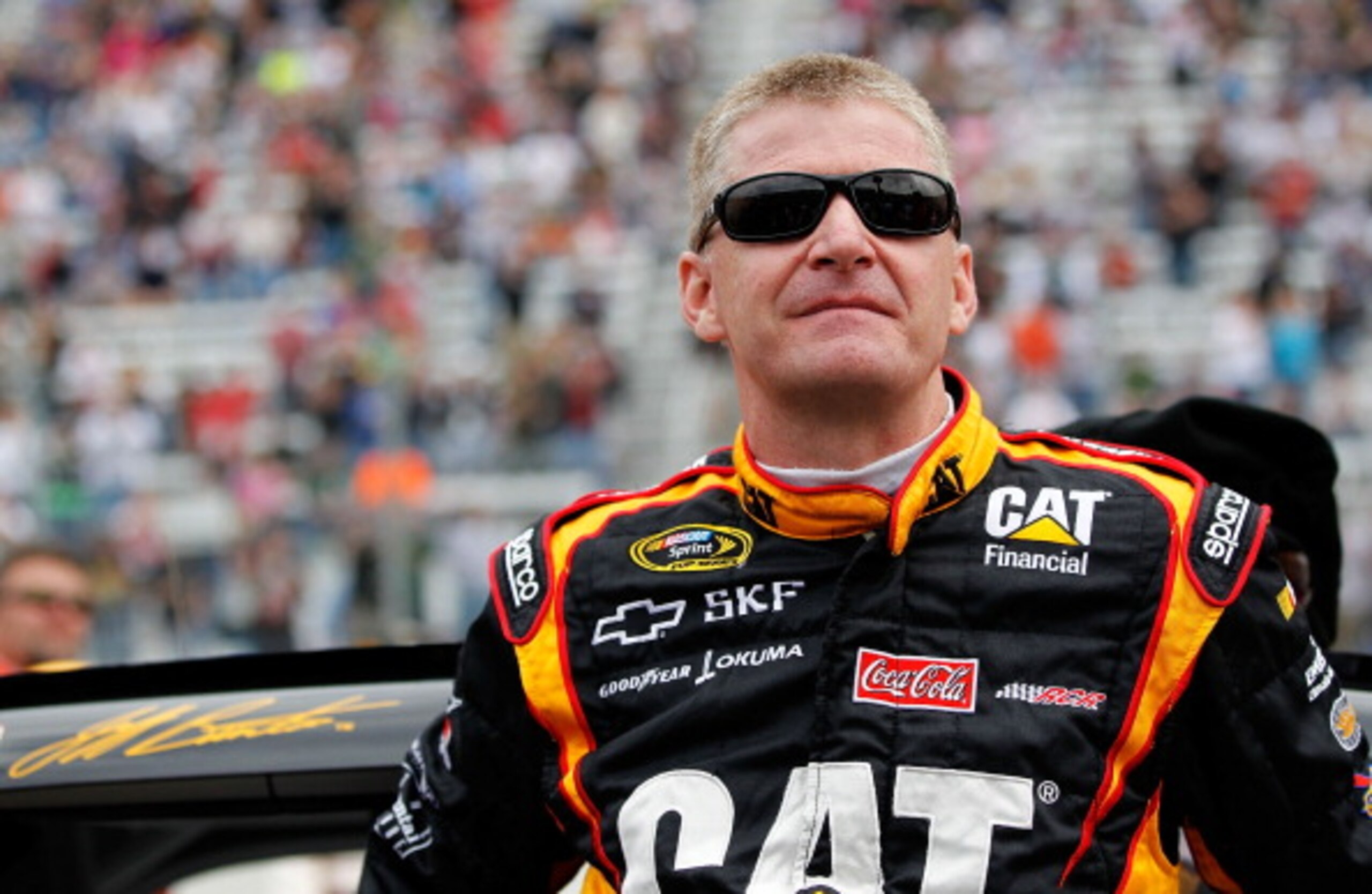 BRISTOL, TN - MARCH 20: Jeff Burton, driver of the #31 Caterpillar Chevrolet, stands on the grid prior to the start of the NASCAR Sprint Cup Series Jeff Byrd 500 Presented By Food City at Bristol Motor Speedway on March 20, 2011 in Bristol, Tennessee.  (P