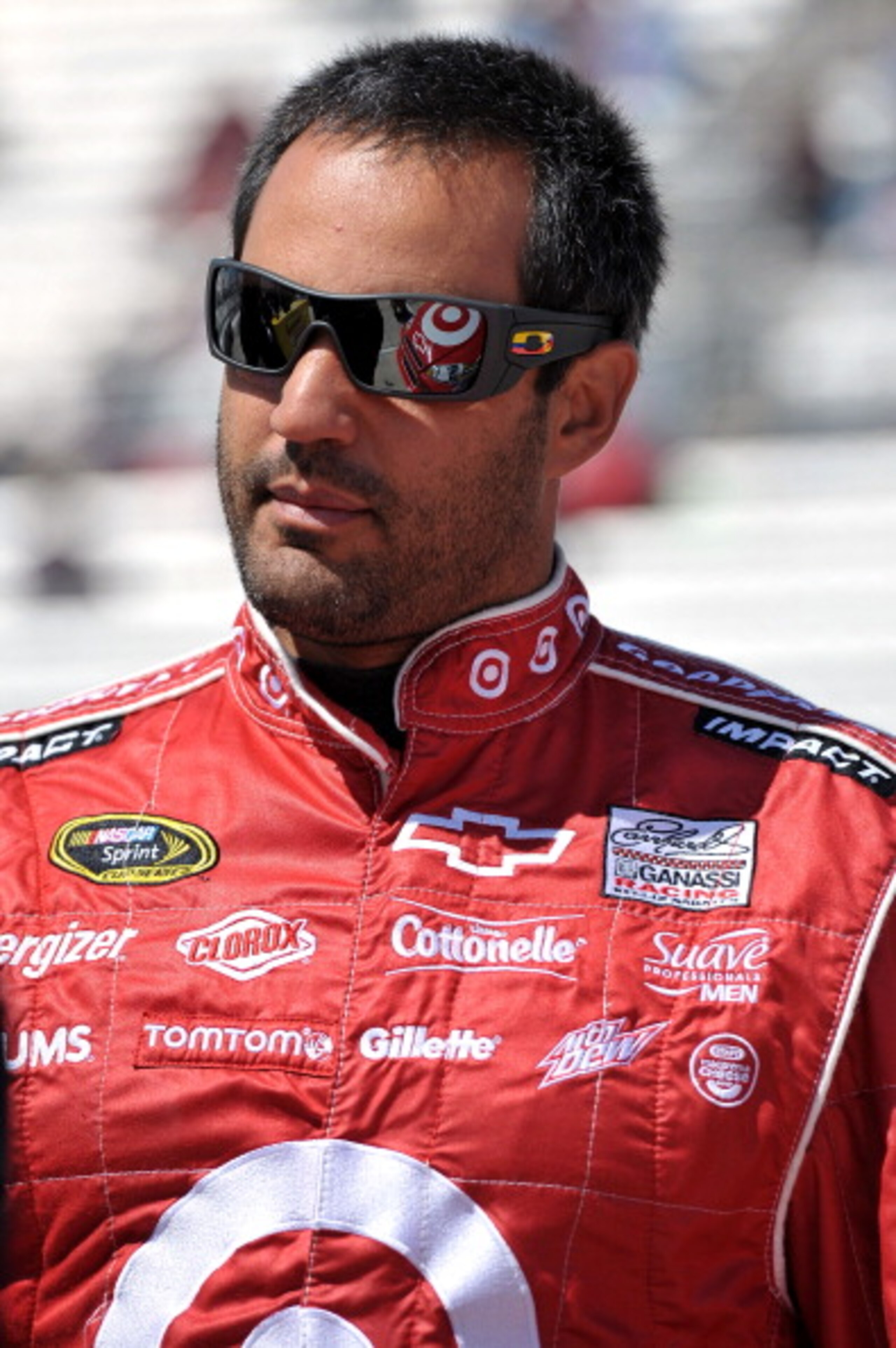 MARTINSVILLE, VA - APRIL 02:  Juan Pablo Montoya, driver of the #42 Target Chevrolet, stands on the grid during qualifying for the NASCAR Sprint Cup Series Goody's Fast Relief 500 at Martinsville Speedway on April 2, 2011 in Martinsville, Virginia.  (Phot