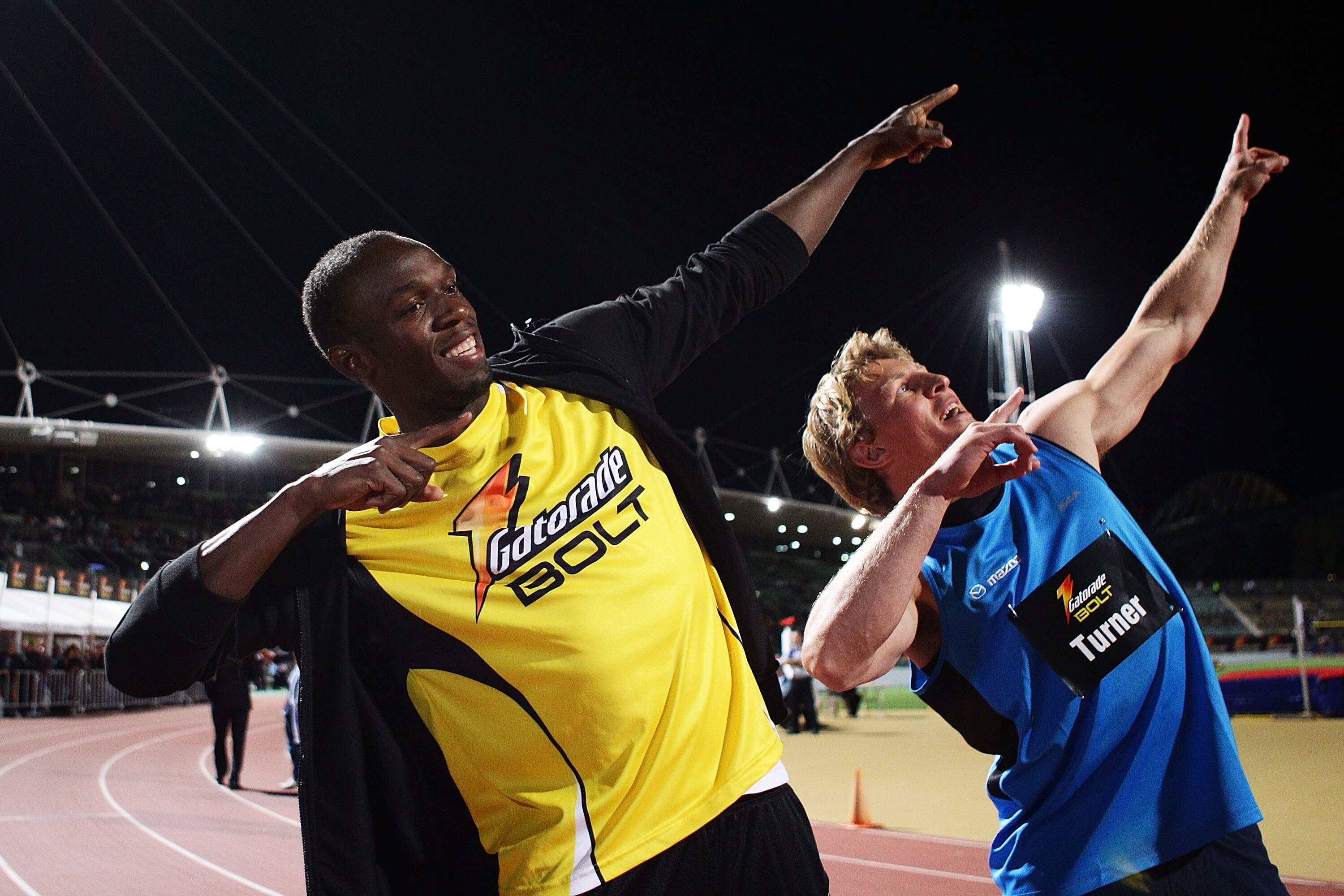 SYDNEY, AUSTRALIA - SEPTEMBER 15:  Usain Bolt of Jamaica (L) and Lachie Turner (R) pose after the 'Gatorage Bolt' during the Athletic Allstars Meet at Sydney Olympic Park Athletic Centre on September 15, 2010 in Sydney, Australia.  (Photo by Matt King/Get