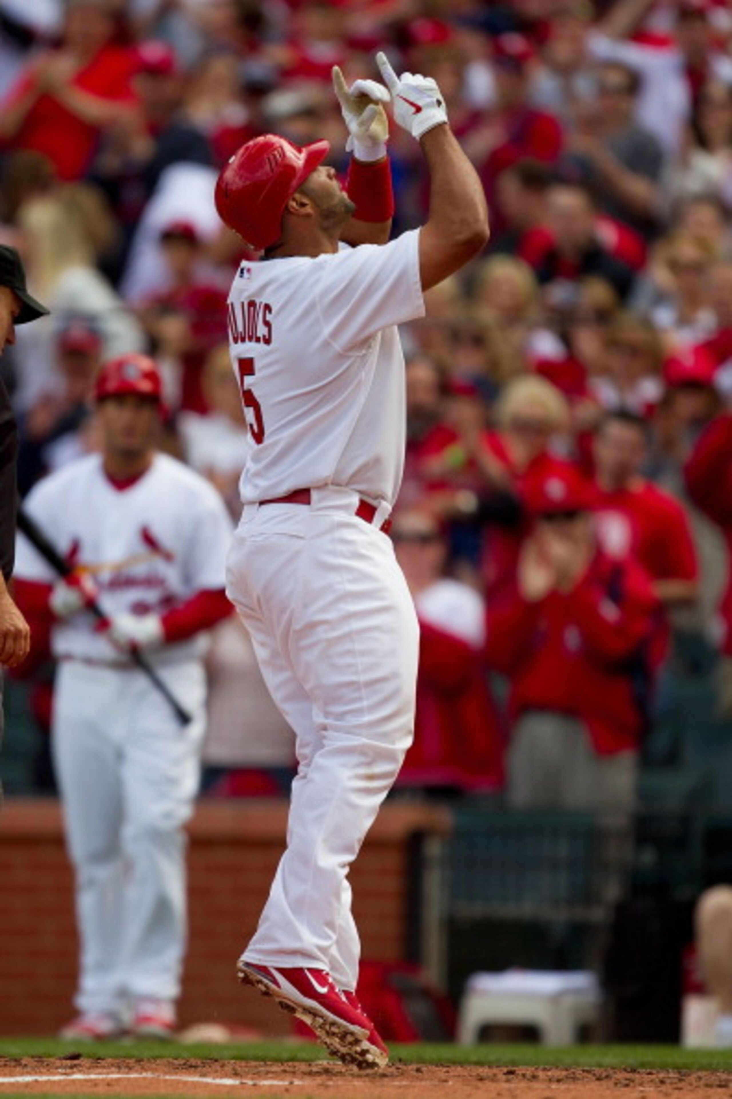 ST. LOUIS, MO - APRIL 2: Albert Pujols #5 of the St. Louis Cardinals celebrates a home run against the San Diego Padres at Busch Stadium on April 2, 2011 in St. Louis, Missouri. (Photo by Dilip Vishwanat/Getty Images) ST. LOUIS, MO - APRIL 2: Albert Pujols #5 of the St. Louis Cardinals celebrates a home run against the San Diego Padres at Busch Stadium on April 2, 2011 in St. Louis, Missouri. (Photo by Dilip Vishwanat/Getty Images)