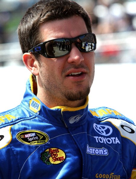 MARTINSVILLE, VA - APRIL 03:  Martin Truex Jr., driver of the #56 NAPA Auto Parts Toyota, stands on the grid prior to the NASCAR Sprint Cup Series Goody's Fast Relief 500 at Martinsville Speedway on April 3, 2011 in Martinsville, Virginia.  (Photo by Jerr