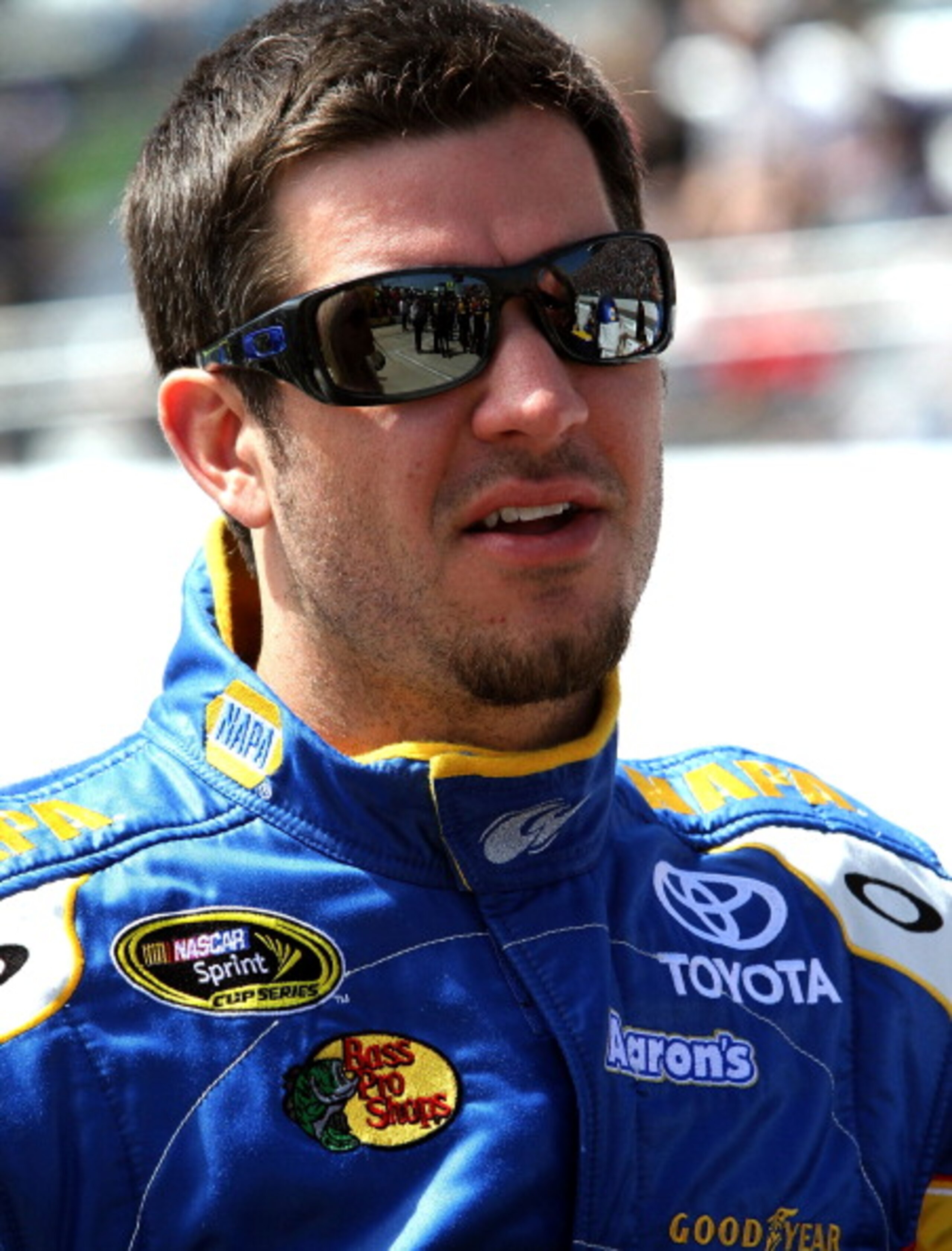 MARTINSVILLE, VA - APRIL 03:  Martin Truex Jr., driver of the #56 NAPA Auto Parts Toyota, stands on the grid prior to the NASCAR Sprint Cup Series Goody's Fast Relief 500 at Martinsville Speedway on April 3, 2011 in Martinsville, Virginia.  (Photo by Jerr