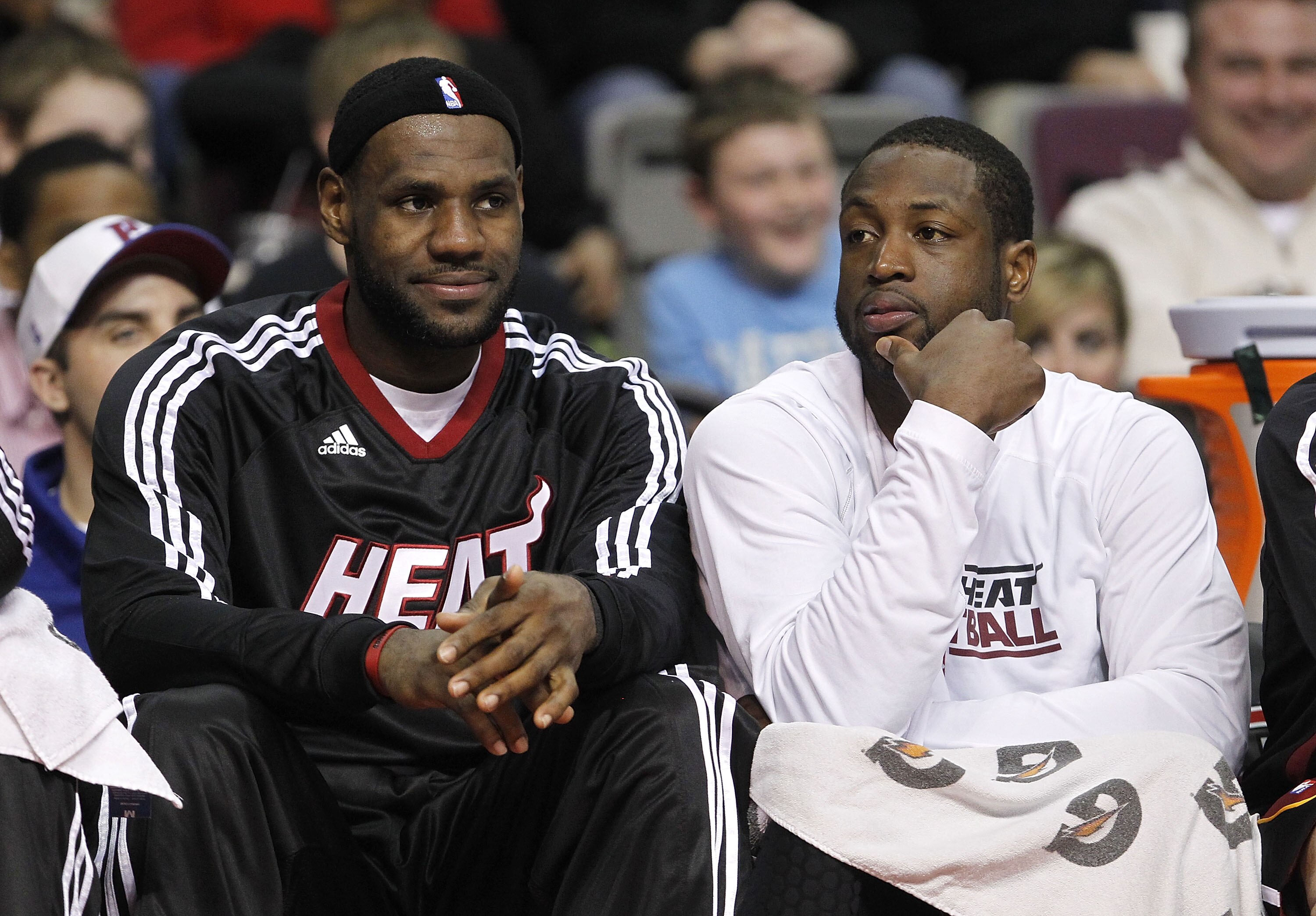AUBURN HILLS, MI - MARCH 23:  Dwyane Wade #3 (R) of the Miami Heat looks on from the bench with teammate LeBron James #6 while playing the Detroit Pistons at The Palace of Auburn Hills on March 23, 2011 in Auburn Hills, Michigan. Miami won the game 100-94