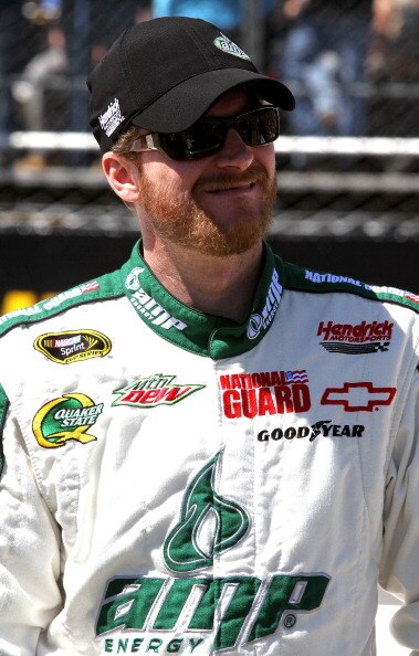 MARTINSVILLE, VA - APRIL 03:  Dale Earnhardt Jr., driver of the #88 Amp Energy/National Guard Chevrolet, stands on the grid prior to the NASCAR Sprint Cup Series Goody's Fast Relief 500 at Martinsville Speedway on April 3, 2011 in Martinsville, Virginia.