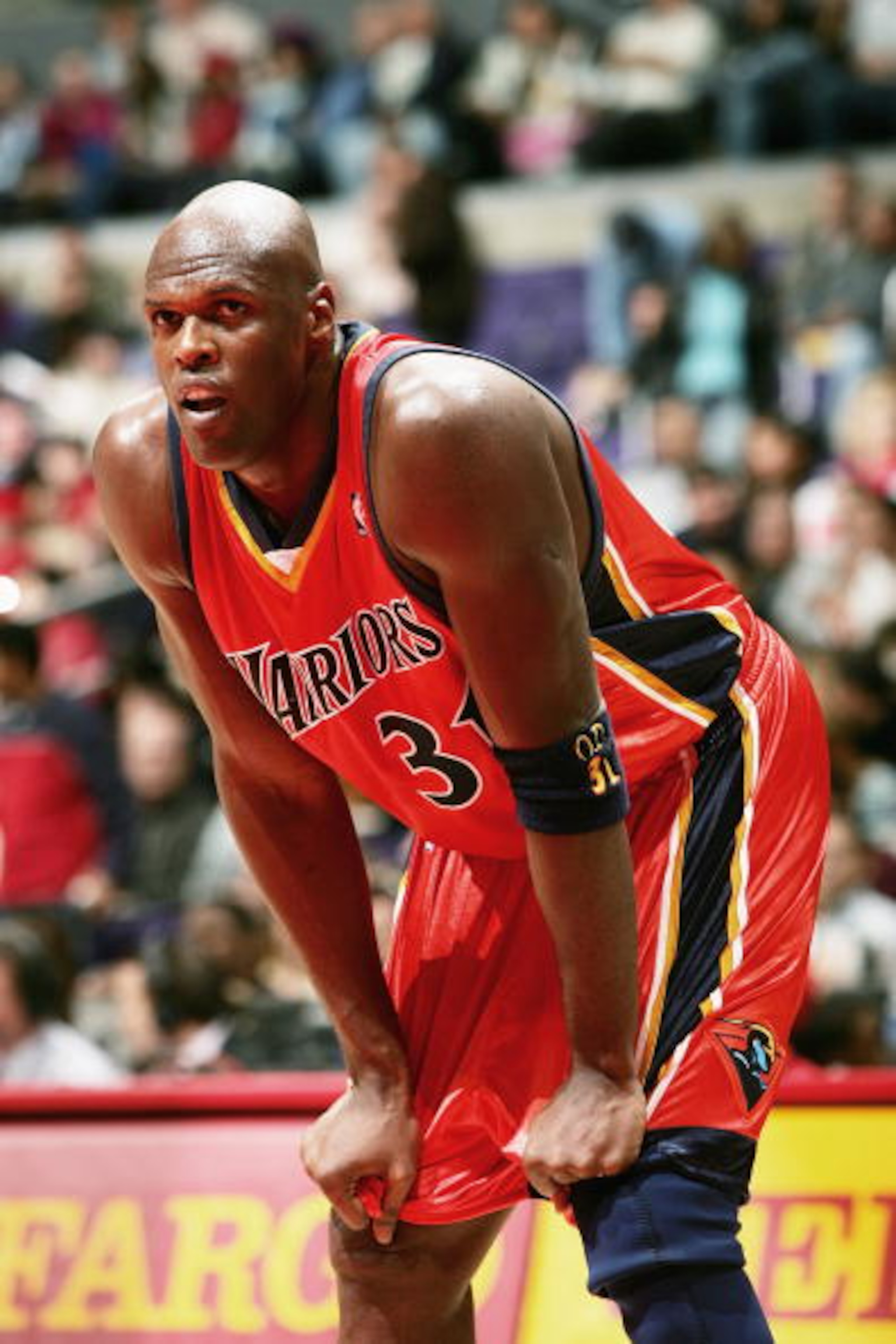 LOS ANGELES - JANUARY 29: Adonal Foyle #31 of the Golden State Warriors looks on against the Los Angeles Clippers on January 29, 2005 at the Staples Center in Los Angeles, California. The Clippers won 96-85. NOTE TO USER: User expressly acknowledges and LOS ANGELES - JANUARY 29: Adonal Foyle #31 of the Golden State Warriors looks on against the Los Angeles Clippers on January 29, 2005 at the Staples Center in Los Angeles, California. The Clippers won 96-85. NOTE TO USER: User expressly acknowledges and