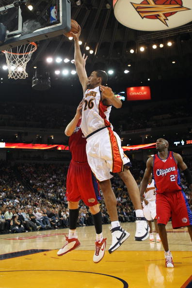 OAKLAND, CA - NOVEMBER 16:  Patrick O'Bryant #26 of the Golden State Warriors elevates for a dunk during the game against the Los Angeles Clippers at Oracle Arena on November 16, 2007 in Oakland, California.  The Warriors won 122-105.  NOTE TO USER: User
