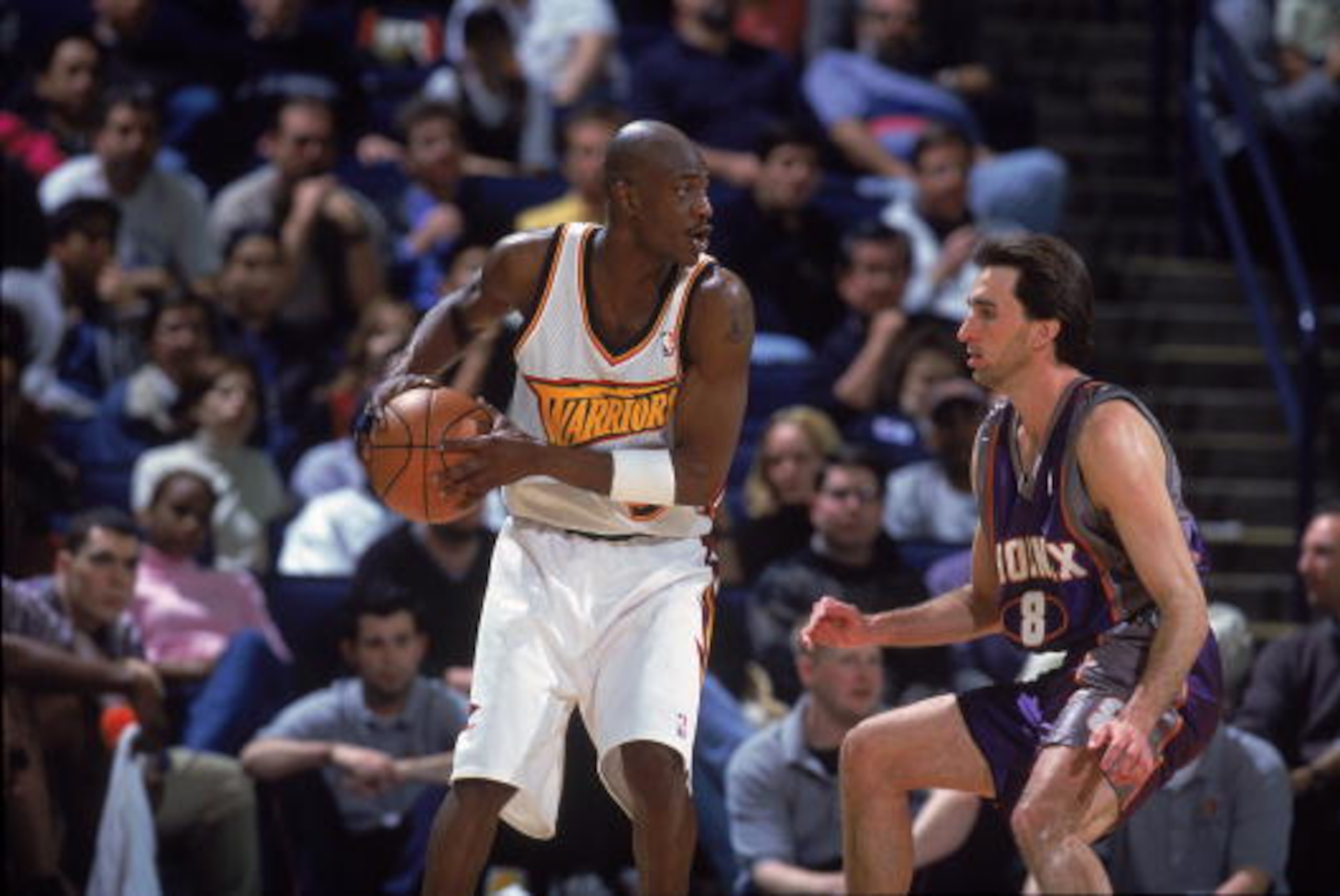 13 Feb 2001: Vonteego Cummings #5 of the Golden State Warriors moves with the ball against Vinny Del Negro #8 of the Phoenix Suns during the game at The Arena in Oakland, California. The Suns defeated the Warriors 93-83. NOTE TO USER: It is expressly un 13 Feb 2001: Vonteego Cummings #5 of the Golden State Warriors moves with the ball against Vinny Del Negro #8 of the Phoenix Suns during the game at The Arena in Oakland, California. The Suns defeated the Warriors 93-83. NOTE TO USER: It is expressly un