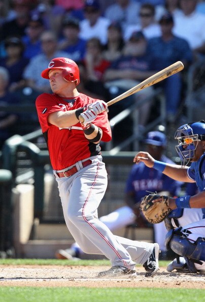 SURPRISE, AZ - MARCH 11: Chris Valaika #3 of the Cincinnati Reds hits a 2 RBI single against the Texas Rangers during the second inning of the spring training game at Surprise Stadium on March 11, 2011 in Surprise, Arizona. (Photo by Christian Petersen/ SURPRISE, AZ - MARCH 11: Chris Valaika #3 of the Cincinnati Reds hits a 2 RBI single against the Texas Rangers during the second inning of the spring training game at Surprise Stadium on March 11, 2011 in Surprise, Arizona. (Photo by Christian Petersen/