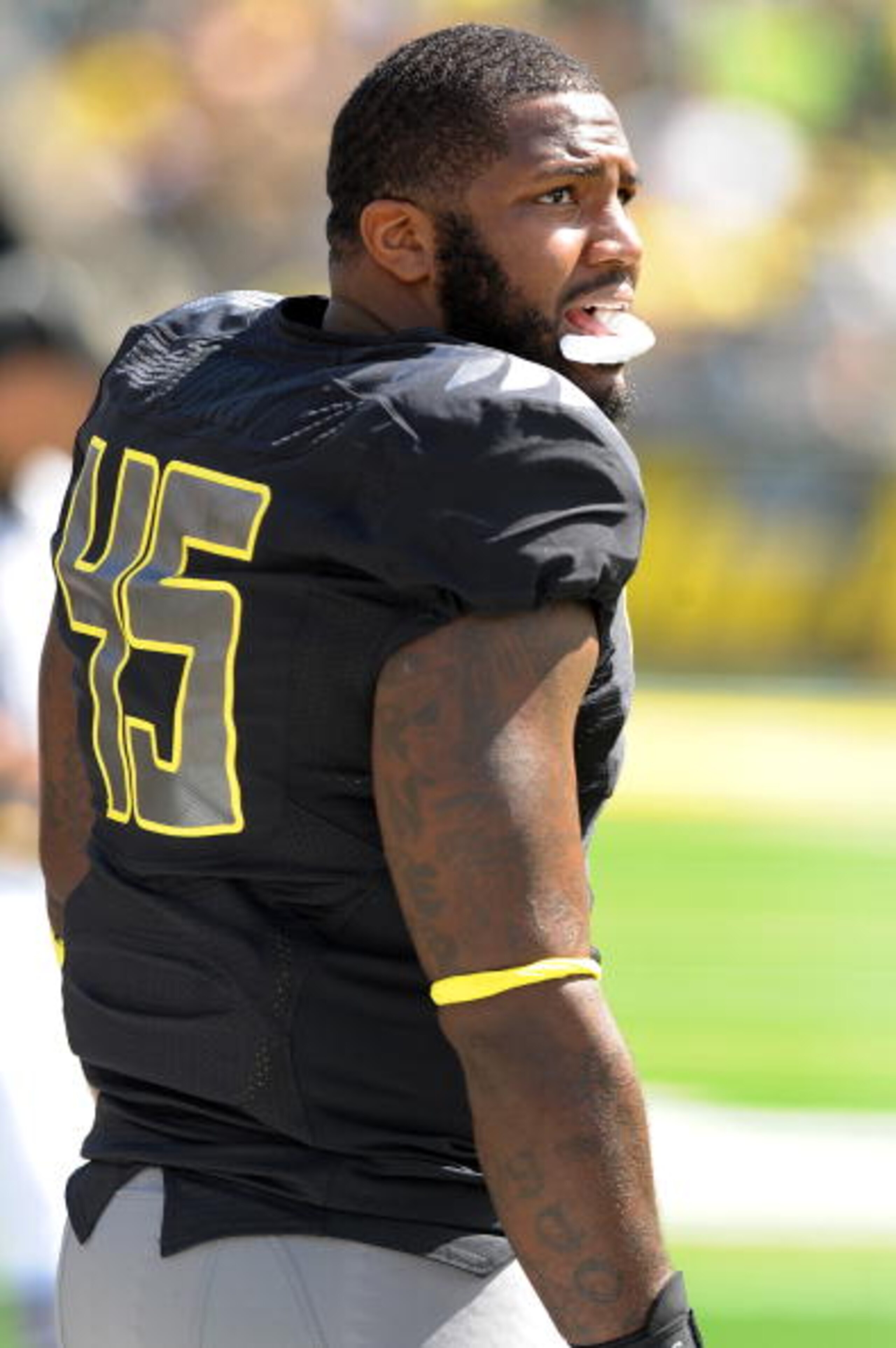 EUGENE, OR - SEPTEMBER 04:  Defensive end Terrell Turner #46 of the Oregon Ducks looks out at the action on the field in the second quarter of the game against the New Mexico Lobos at Autzen Stadium on September 4, 2010 in Eugene, Oregon. Oregon won the g