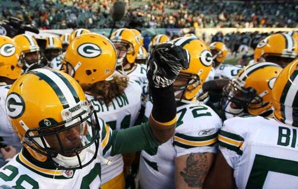 PHILADELPHIA, PA - JANUARY 09:  Brandon Underwood #28 of the Green Bay Packers and his teammates take the field before playing against the Philadelphia Eagles in the 2011 NFC wild card playoff game at Lincoln Financial Field on January 9, 2011 in Philadel